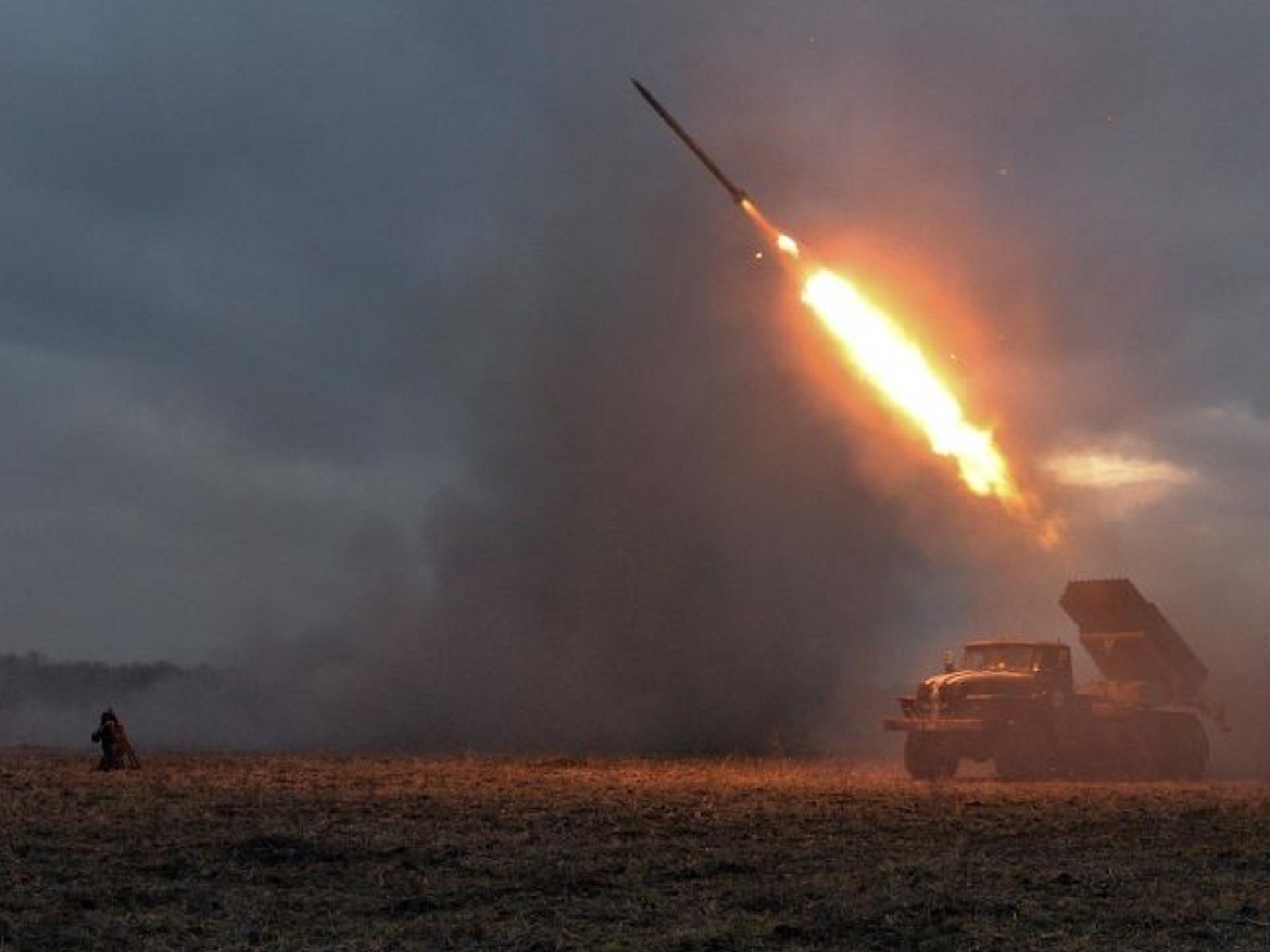 Ukrainian troops launch a Grad rocket towards pro-Russian forces outside Debaltseve