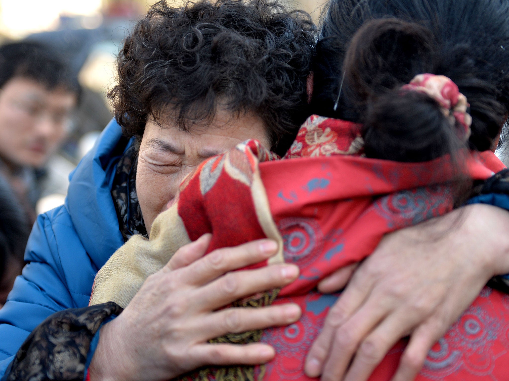 Shang Aiyun, mother of Huugjilt who was wrongly sentenced and executed for a murder case, pictured after attending the trial of Zhao Zhihong in China's Inner Mongolia