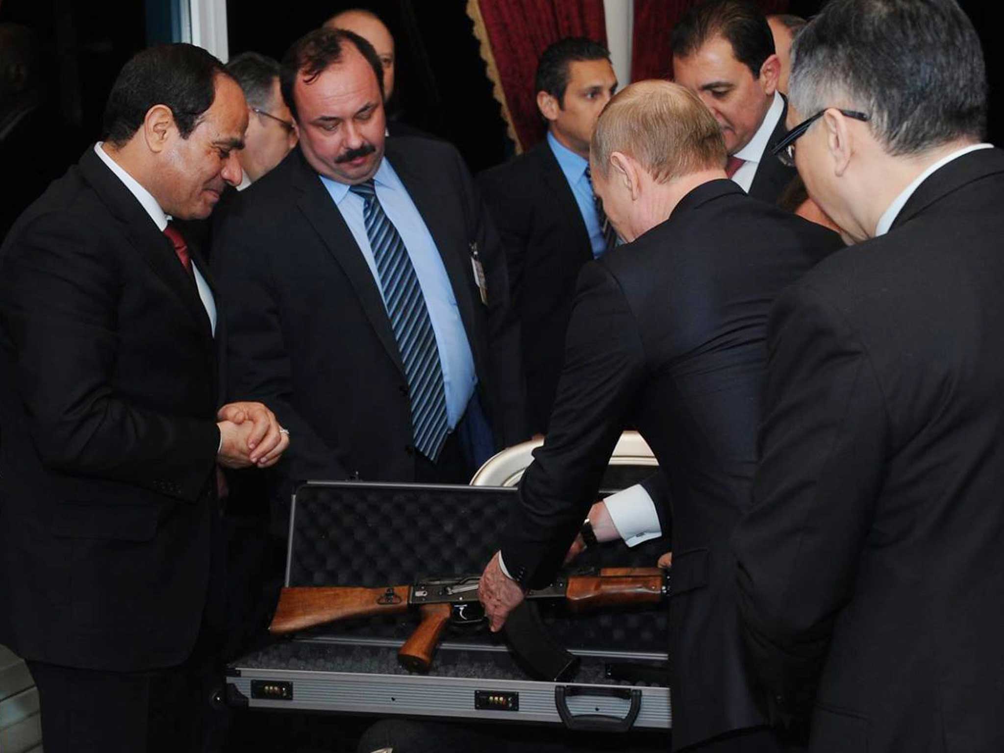 Al-Sisi positively glows with happiness as Putin presents the deadly rifle