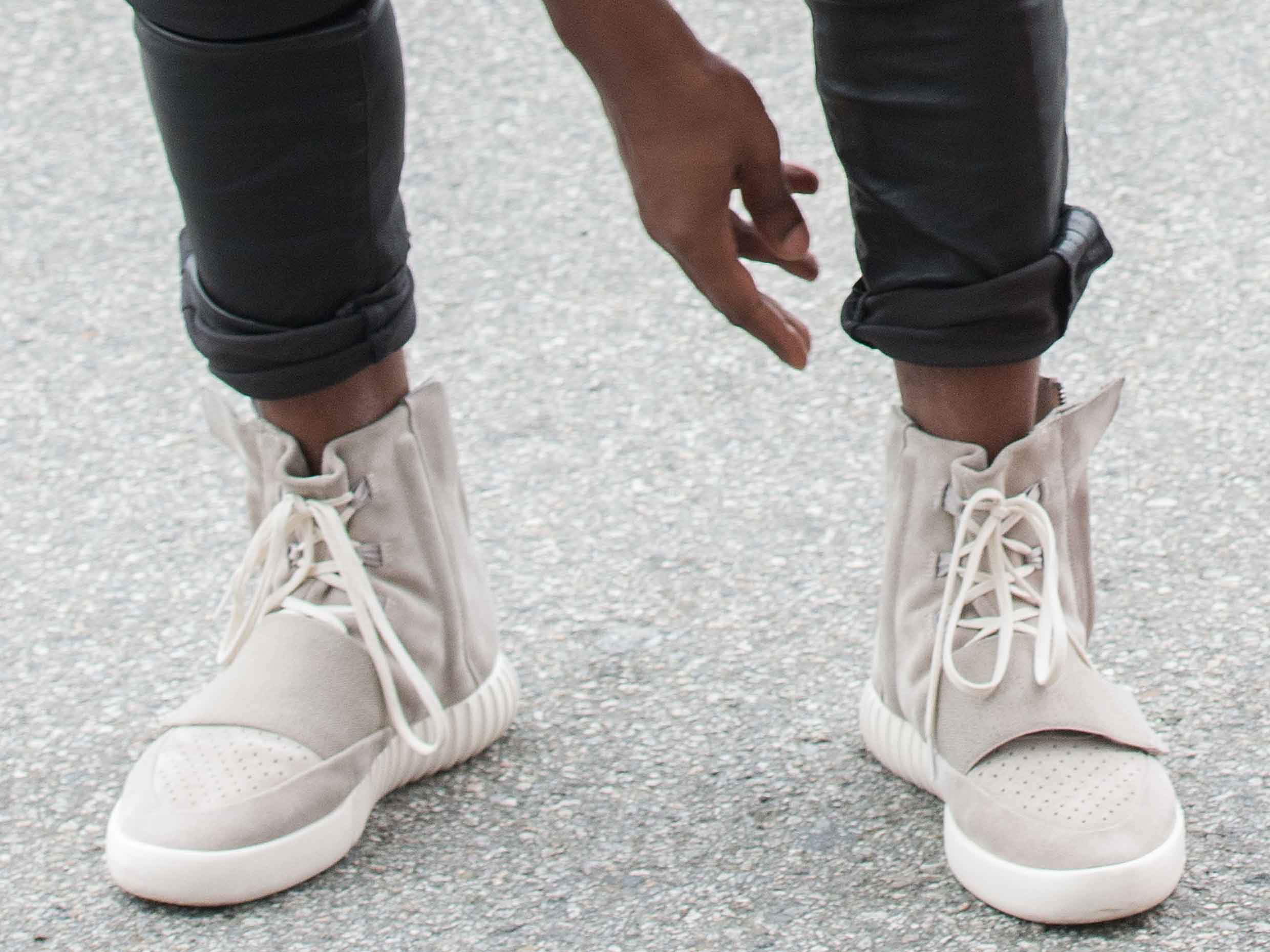 Kanye West models the new Yeezy Boost sneakers