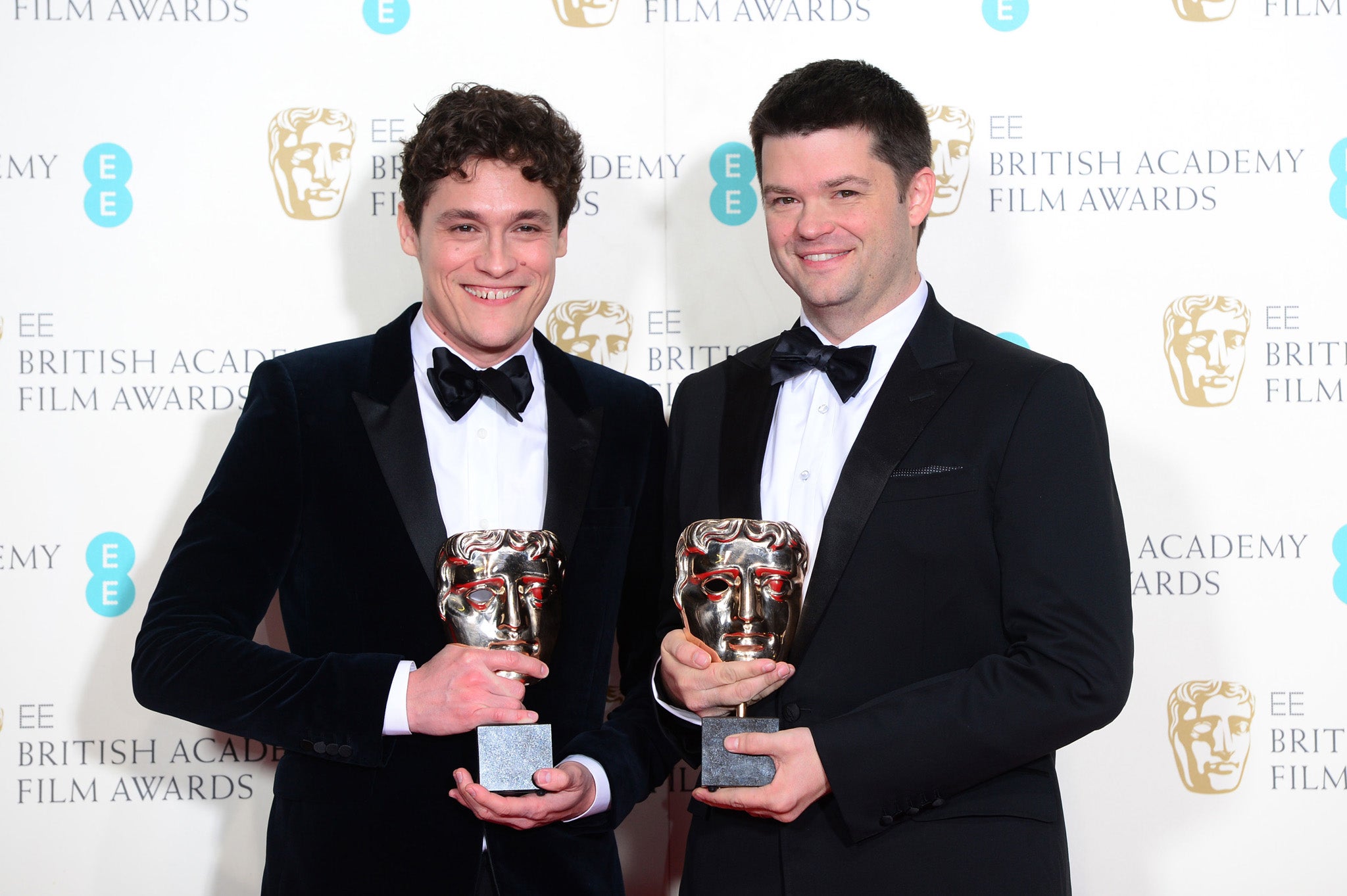 Phil Lord and Christopher Miller (right), winners of the Best Animated Film award for the movie 'Lego Movie'