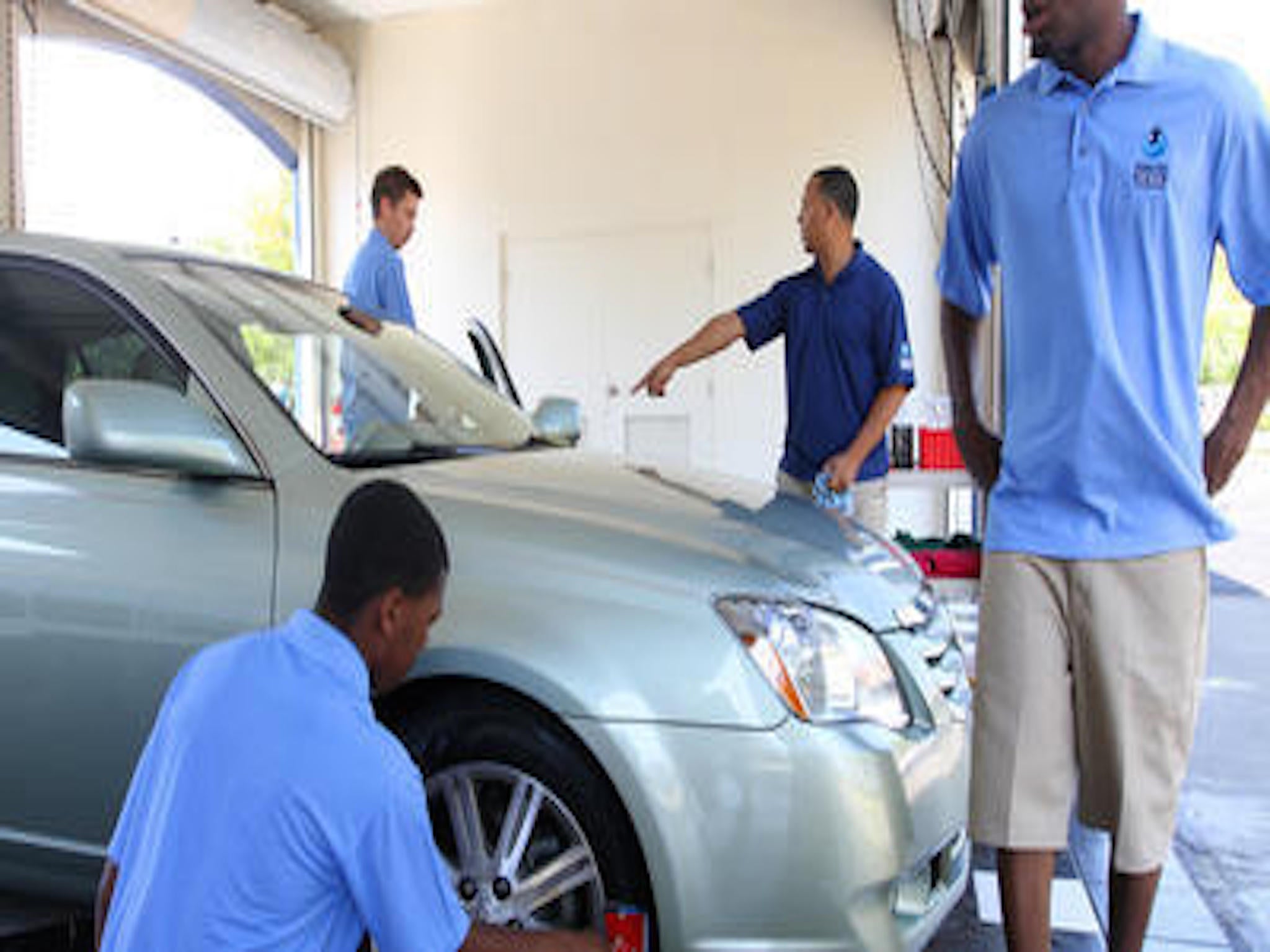 The team at Rising Tide Car Wash at work