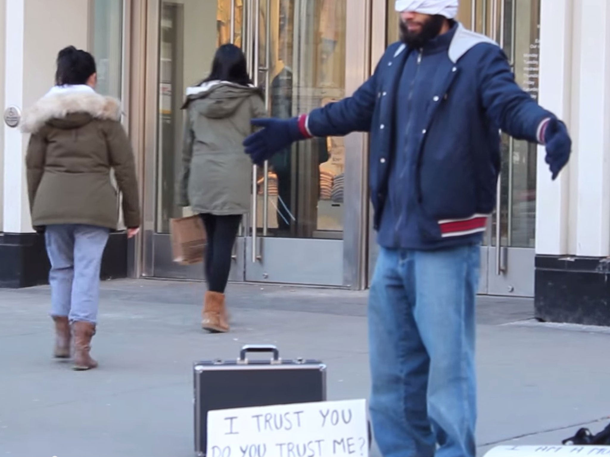 Mustafa Mawla waited in Toronto’s busy Yonge-Dundas Square