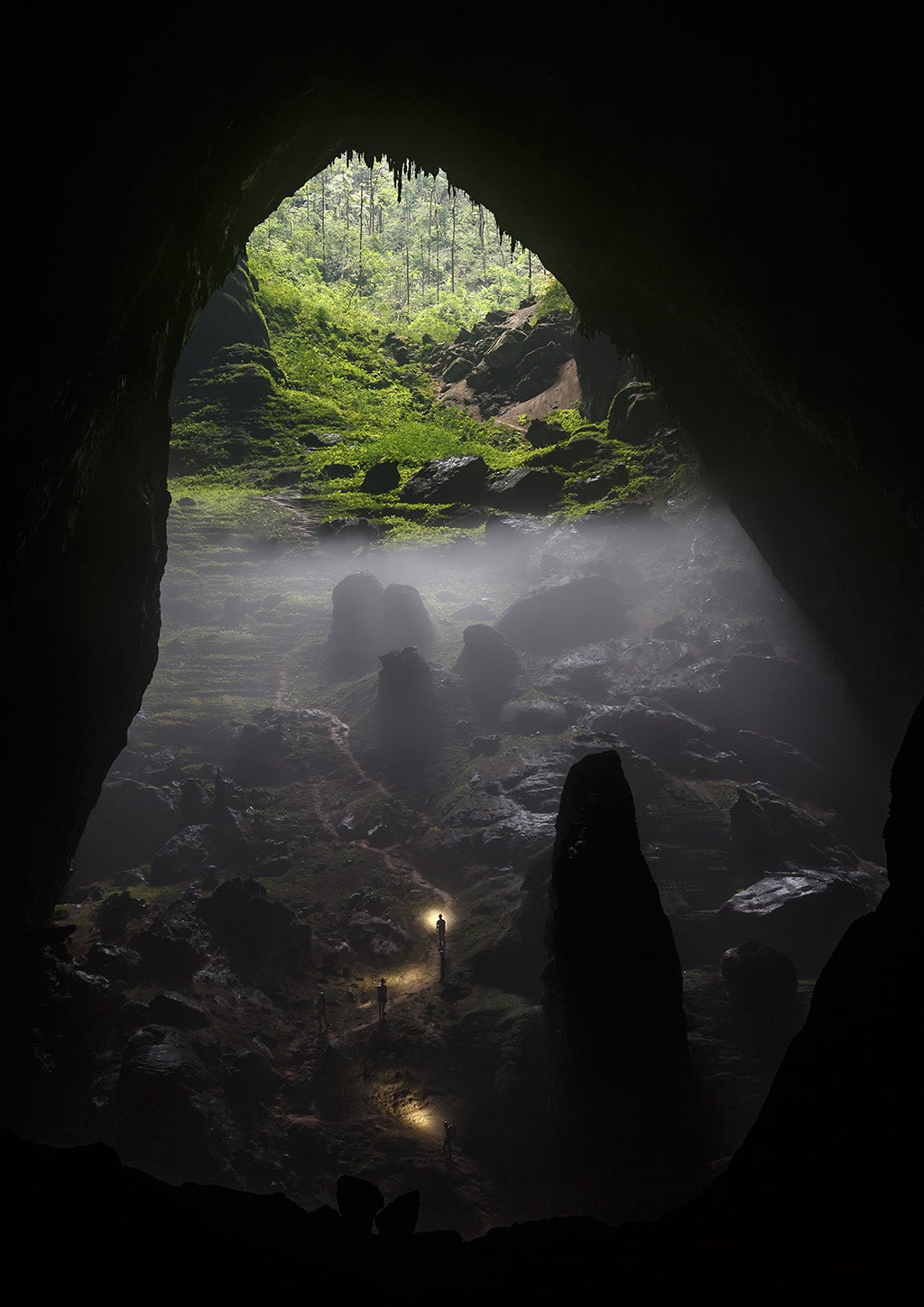 "Son Doong Cave, located deep in the Vietnamese jungle, is the world’s biggest cave and was only explored for the first time in 2009. It’s so big it has its own weather system and a Boeing 747 could fly through its largest cavern.
This photo shows some me