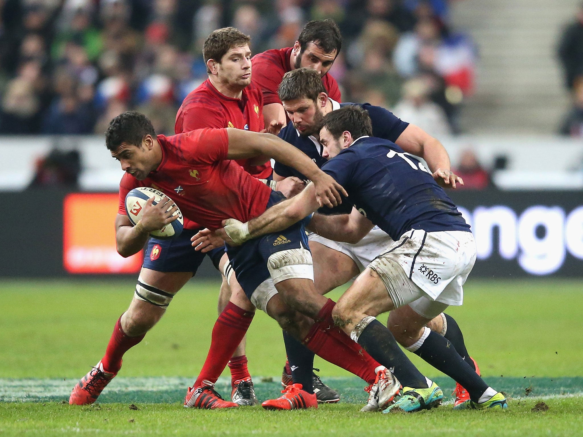 France centre Wesley Fofana evades the clutches of Alex Dunbar