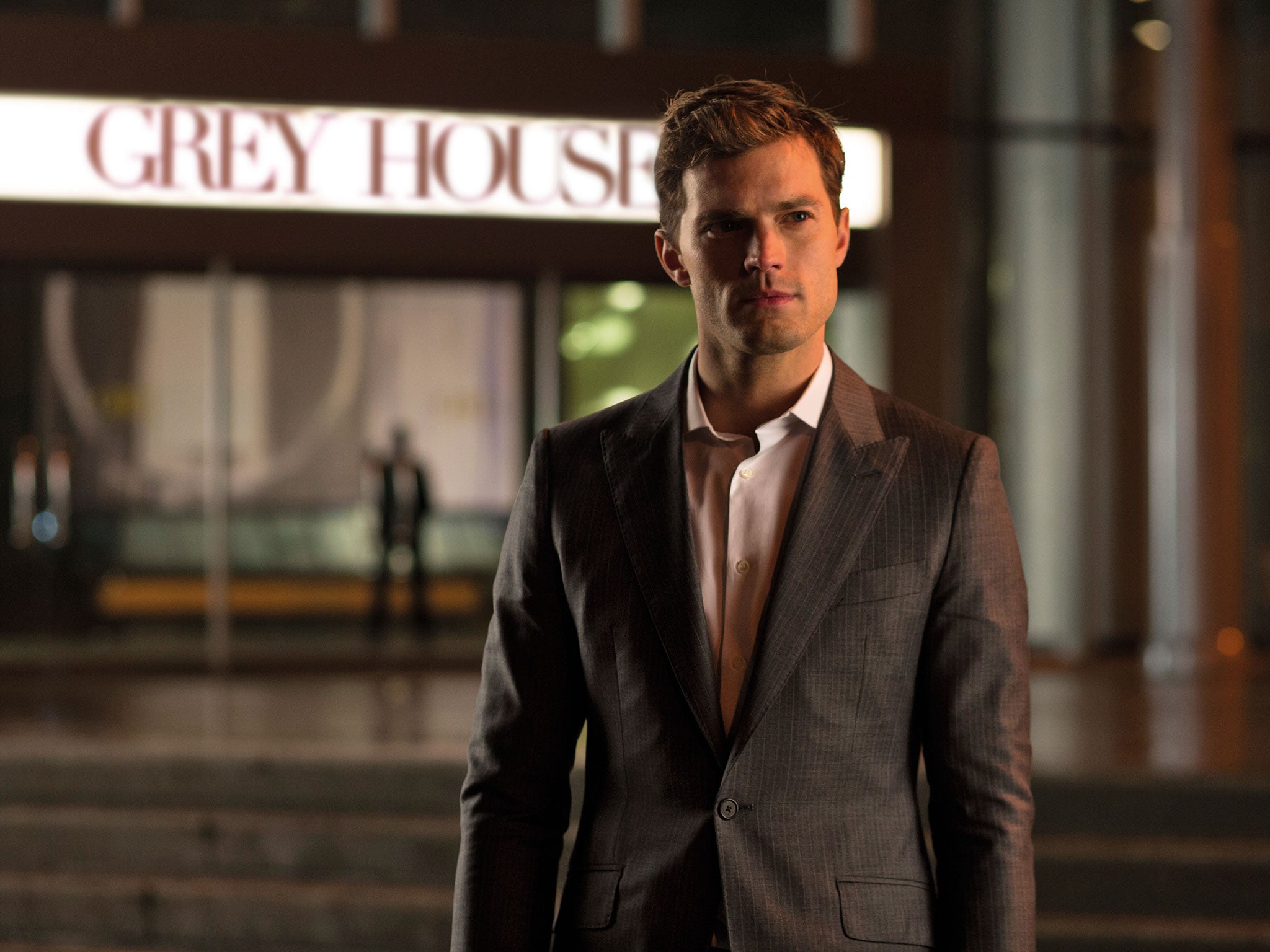 Jamie Dornan as Christian Grey outside Grey Enterprises in Fifty Shades of Grey