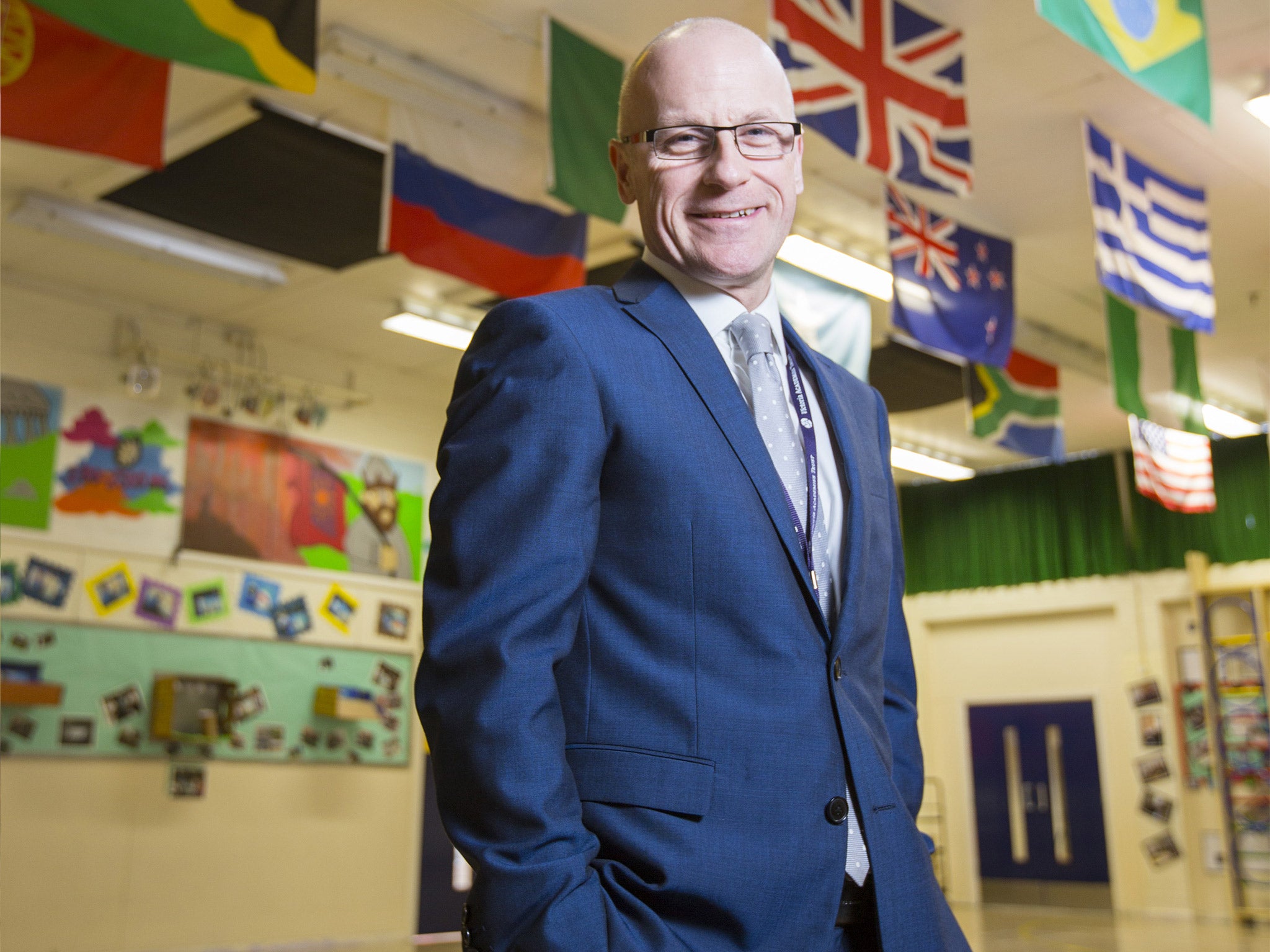 Andrew Morrish with the flags of his pupils' home nations