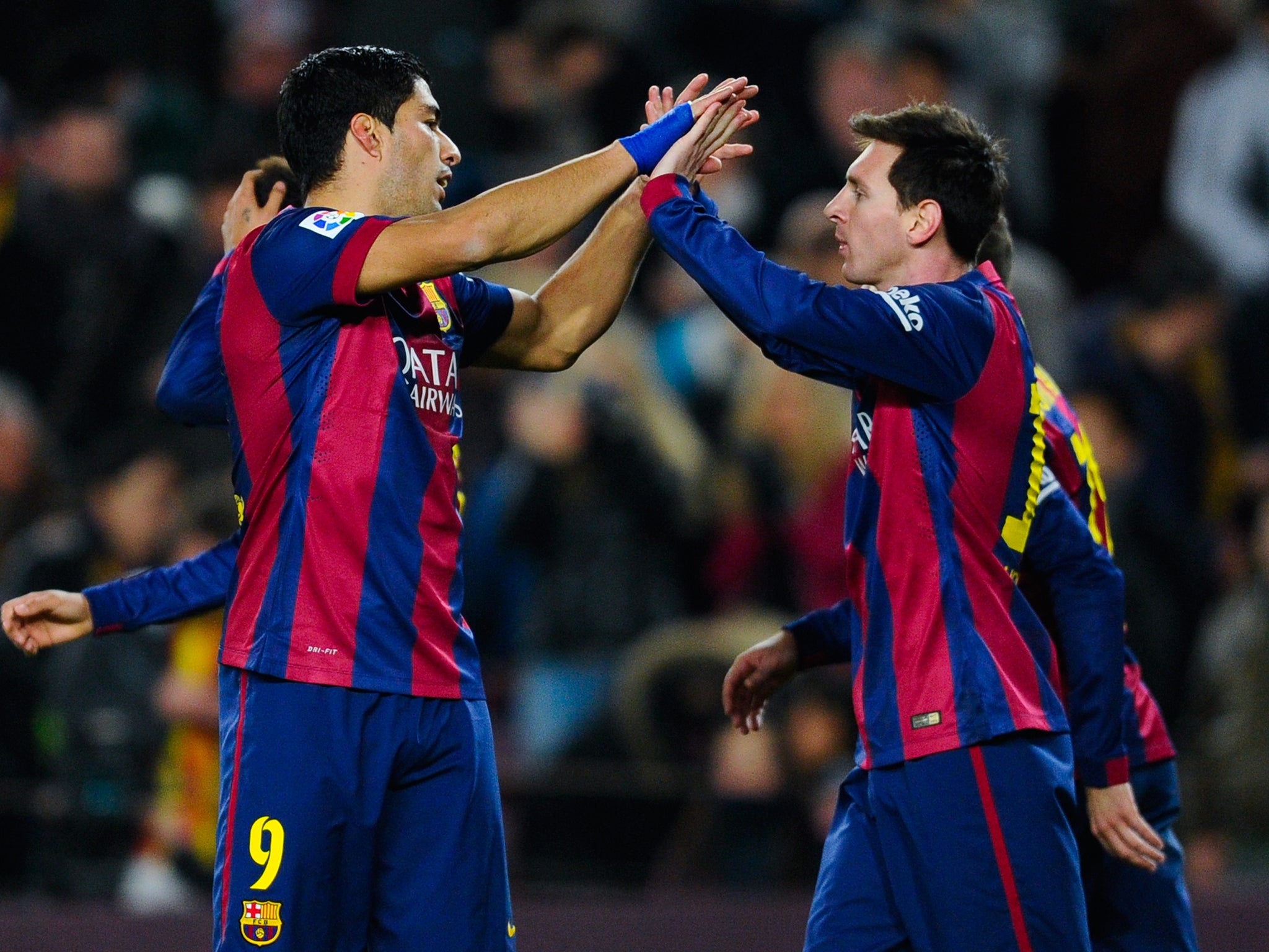 Lionel Messi and Luis Suarez