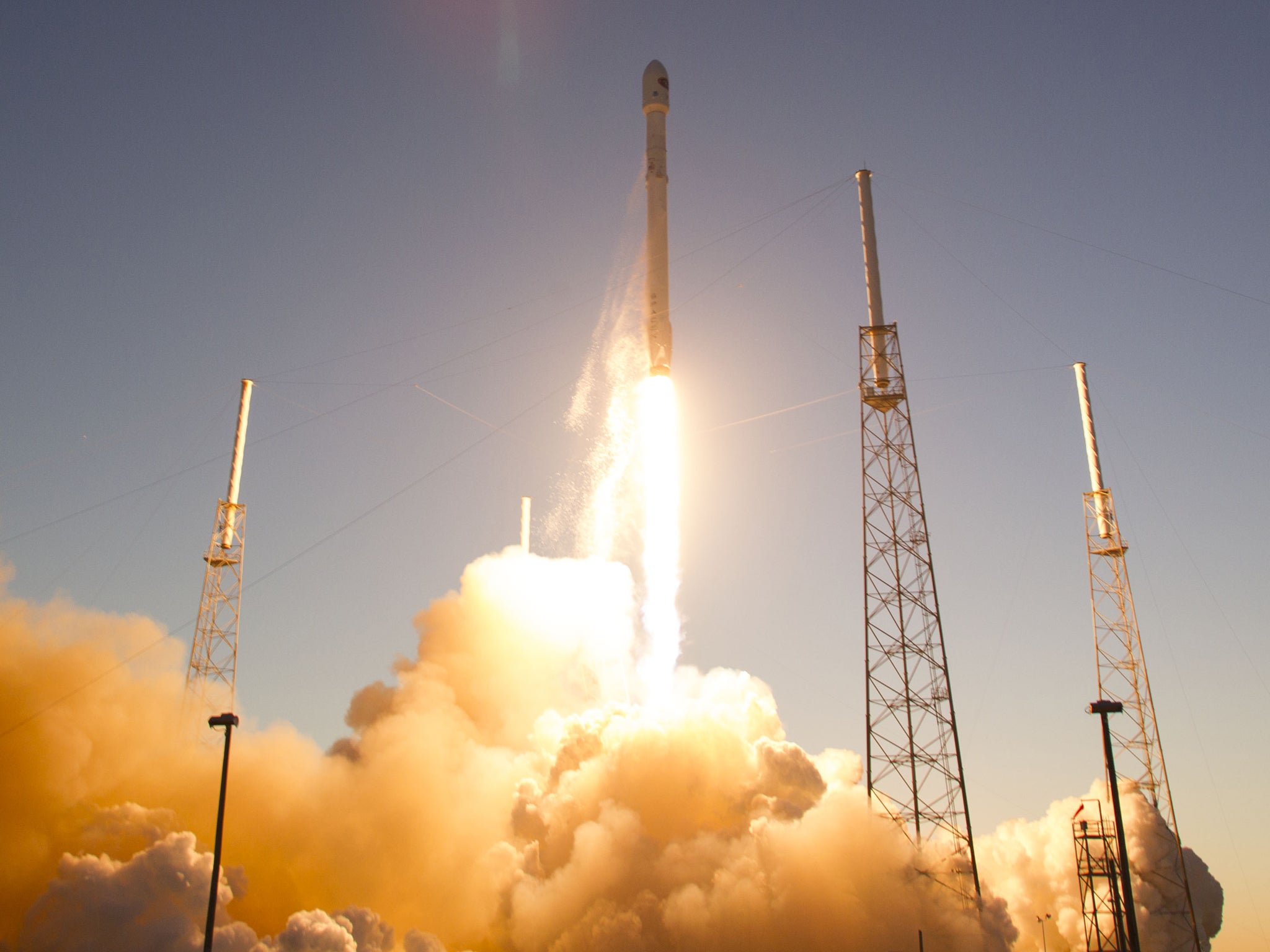 The unmanned Falcon 9 rocket, launched by SpaceX and carrying NOAA's Deep Space Climate Observatory Satellite, lifts off from launch pad 40 the Cape Canaveral Air Force Station