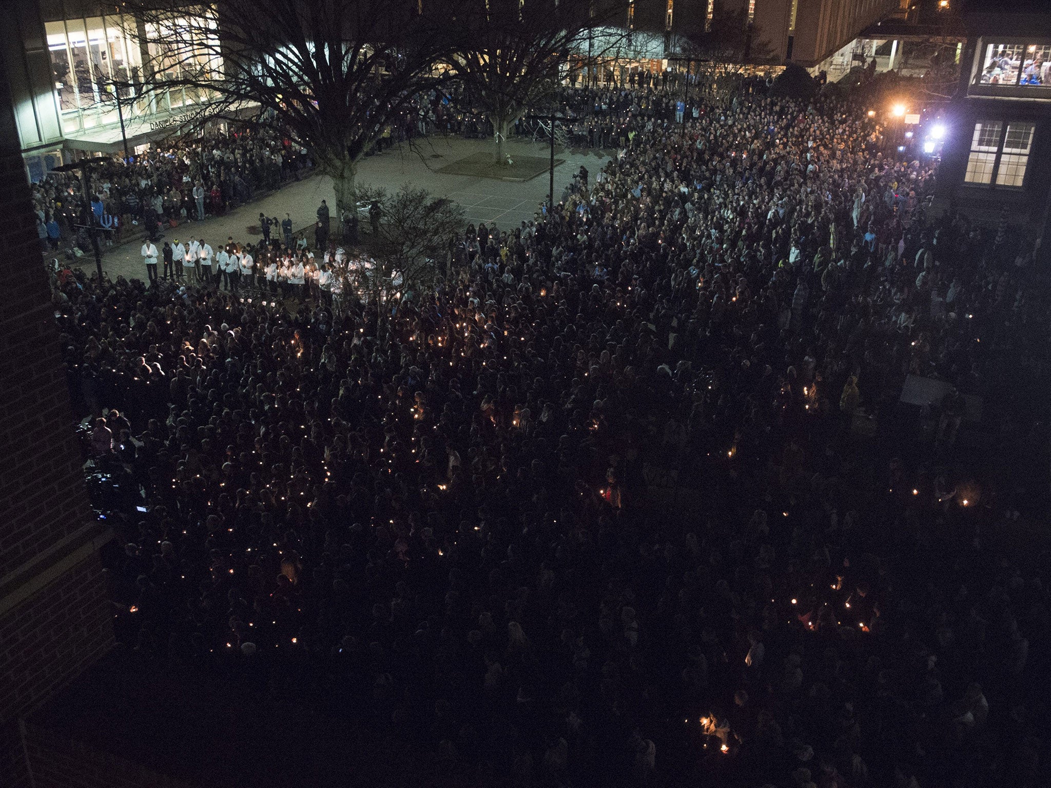 A vigil at 'The Pit' on the campus of the University of North Carolina in memory of Deah Shaddy Barakat, Yusor Mohammad Abu-Salha, and Razan Mohammad Abu-Salha