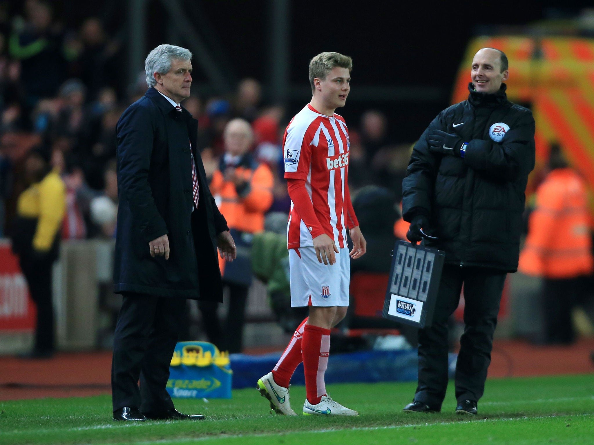 Oliver Shenton is sent on by Mark Hughes for his Premier League debut