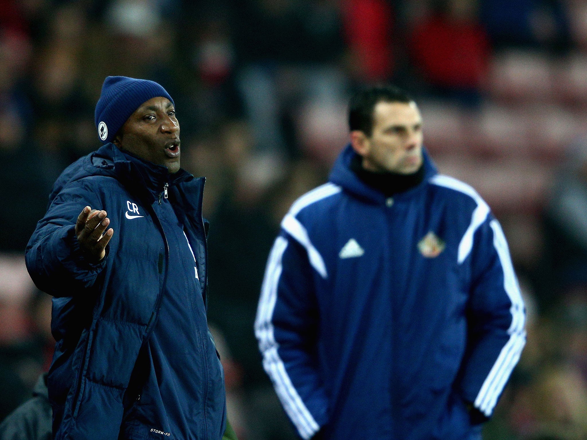 Ramsey and Gus Poyet on the sidelines of QPR's 2-0 win