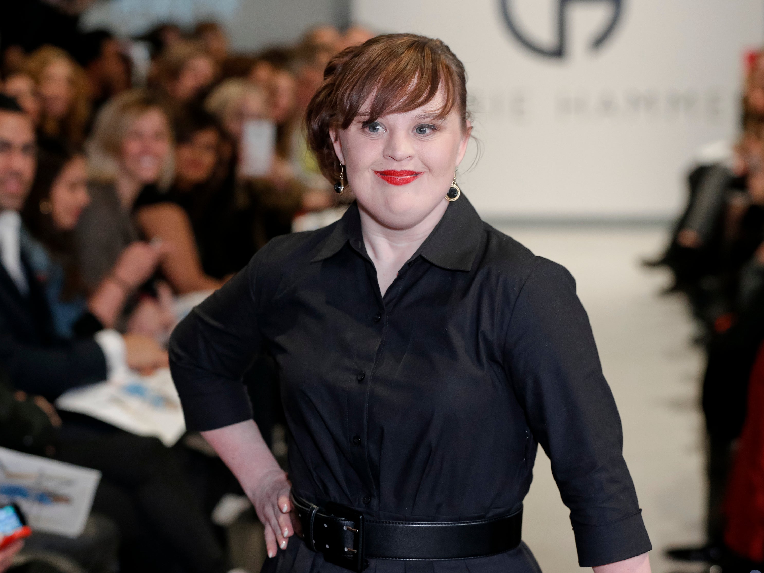 Jamie Brewer working the New York Fashion Week catwalk.