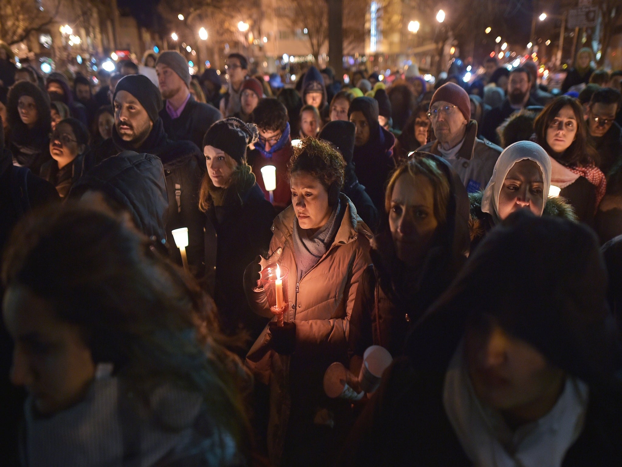 The shooting of three students in Chapel Hill has sparked vigils across the US, including one in Washington DC