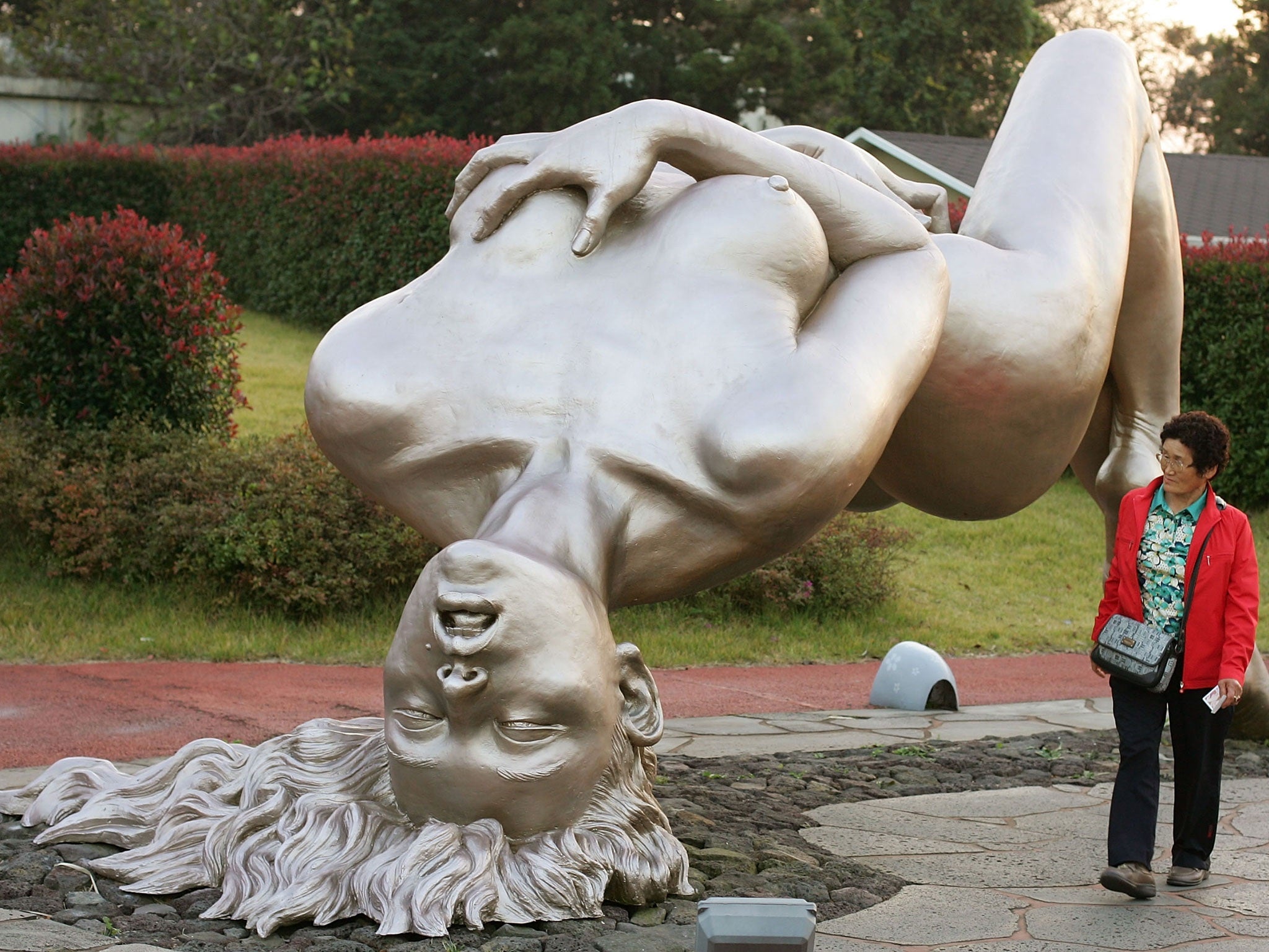 A woman visits the theme park 'Love Land' in South Korea