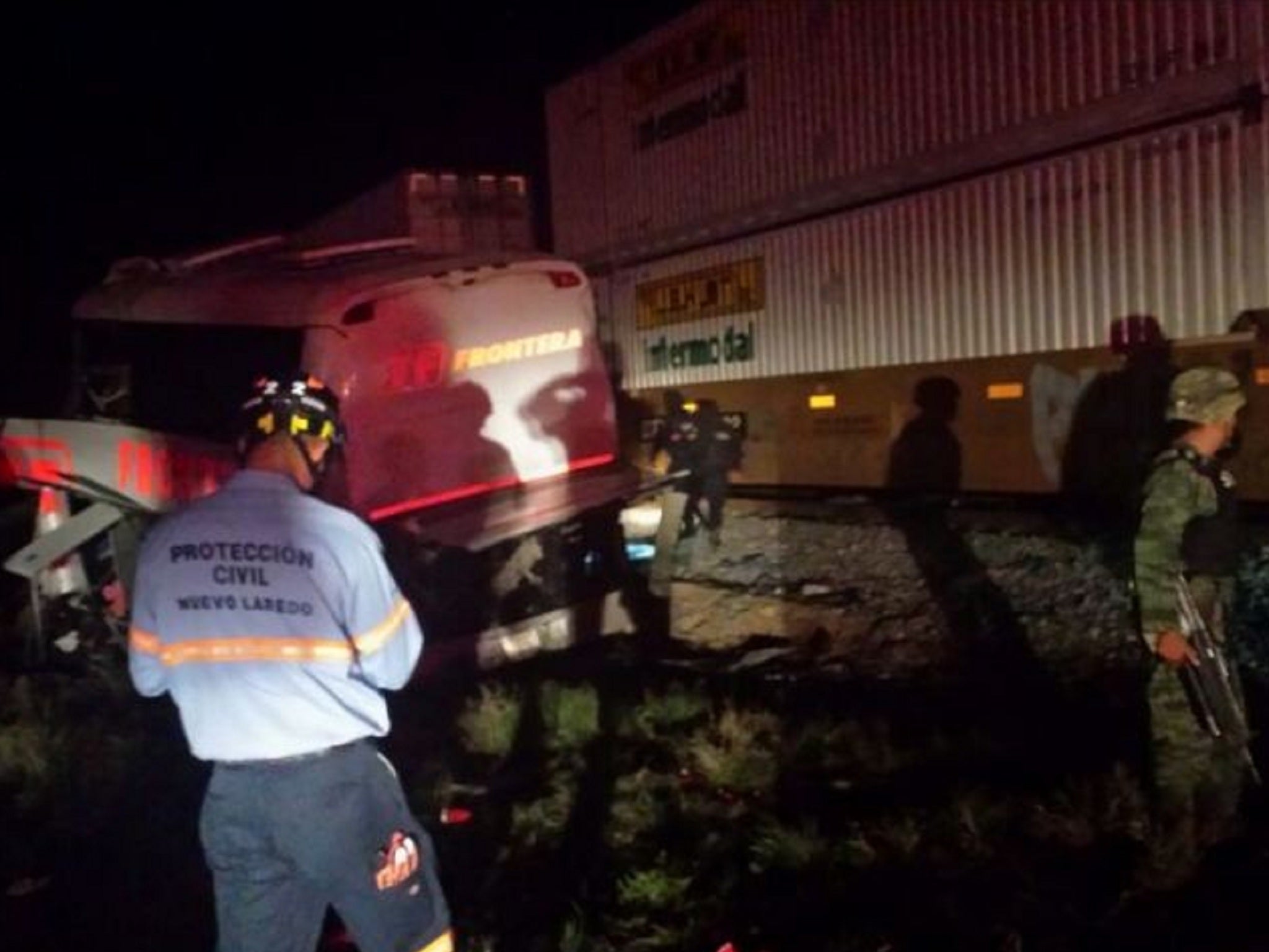 Military and civil protection workers at the scene