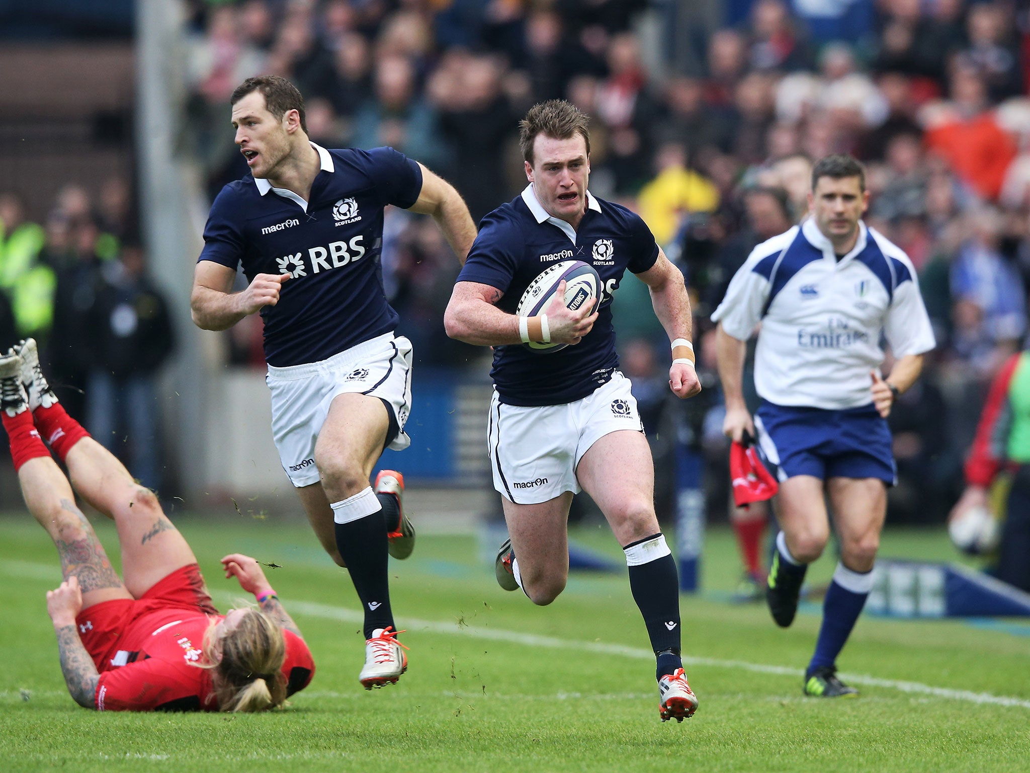 Hogg sprints away from the flailing Welsh defence for the game's opening try