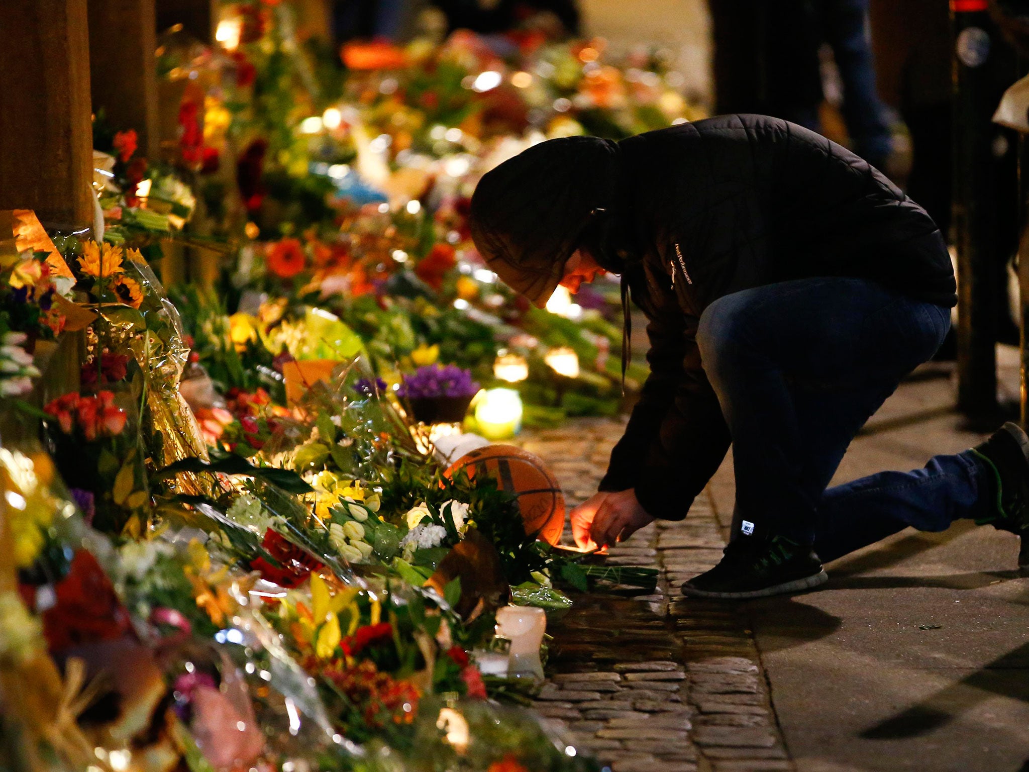 Tributes are laid in front of the synagogue in Krystalgade to the victims of attacks in Copenhagen, which left two people dead