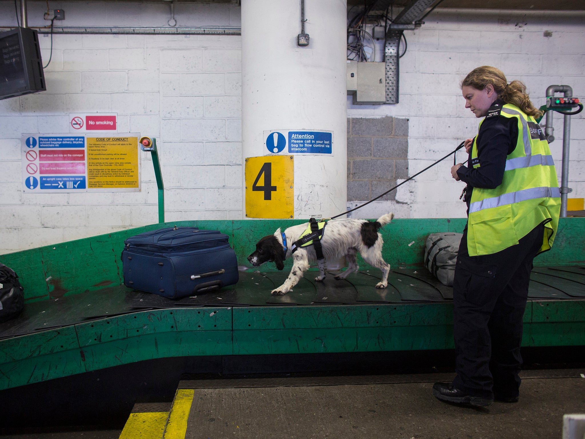 The UK Border Force checks luggage arriving at Gatwick Airport for illegal drugs.