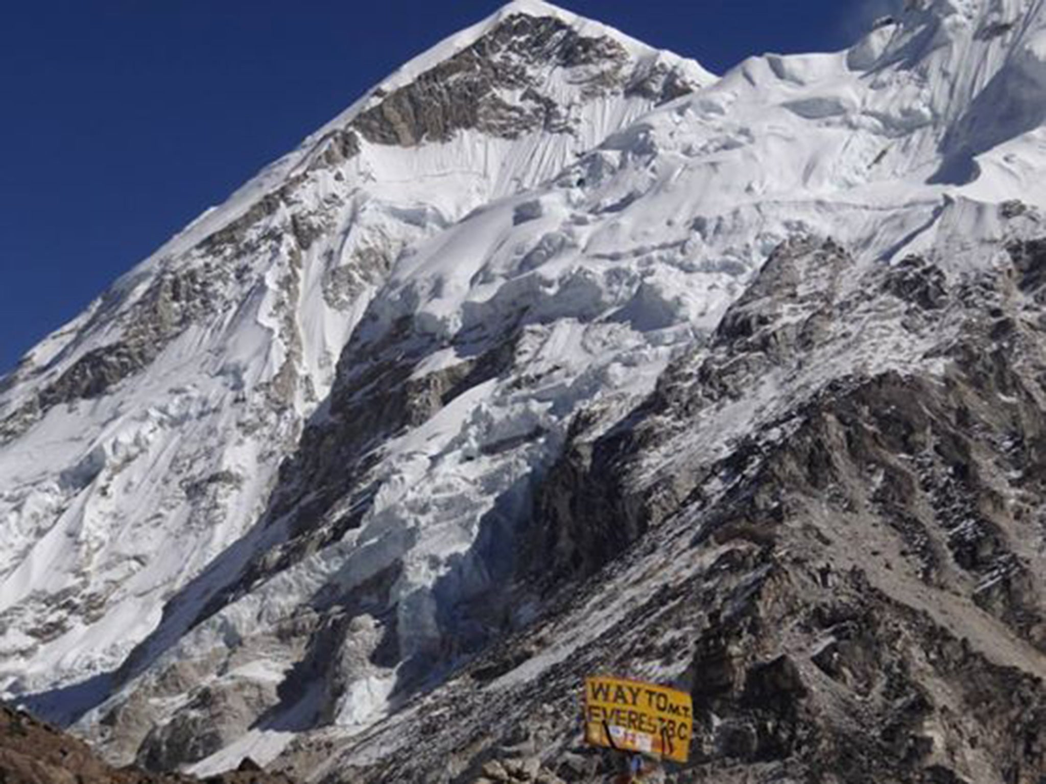 The approach to Everest, with a simple sign showing the way to base camp