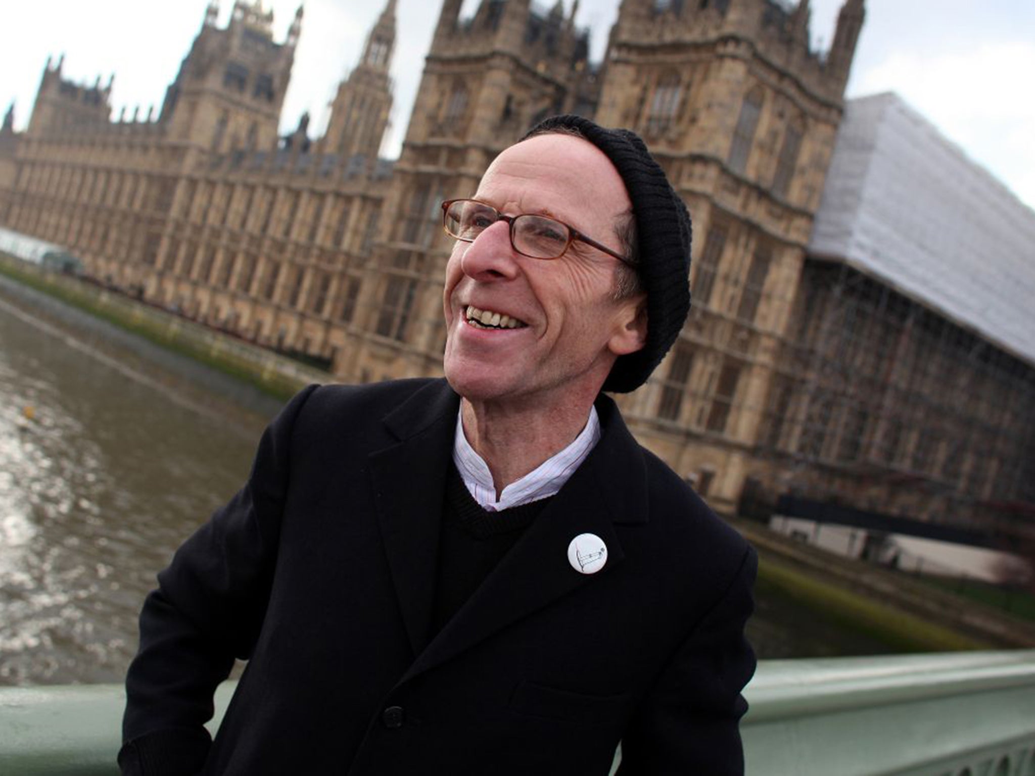 The comic Ivor Demimba outside the Houses of Parliament