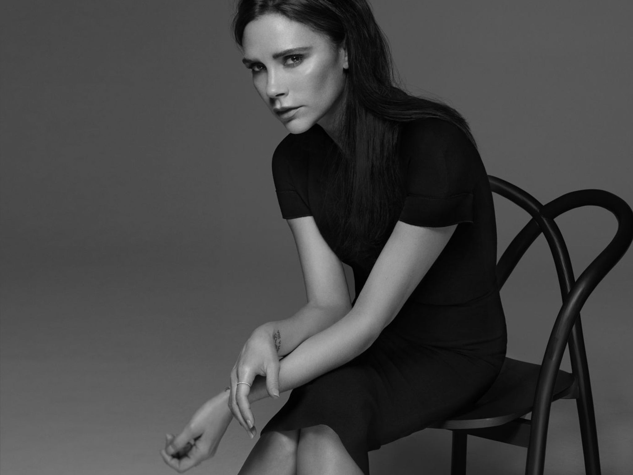 Sitting pretty: Victoria Beckham has enjoyed both retail success and critical acclaim as the creative director of her fashion brand