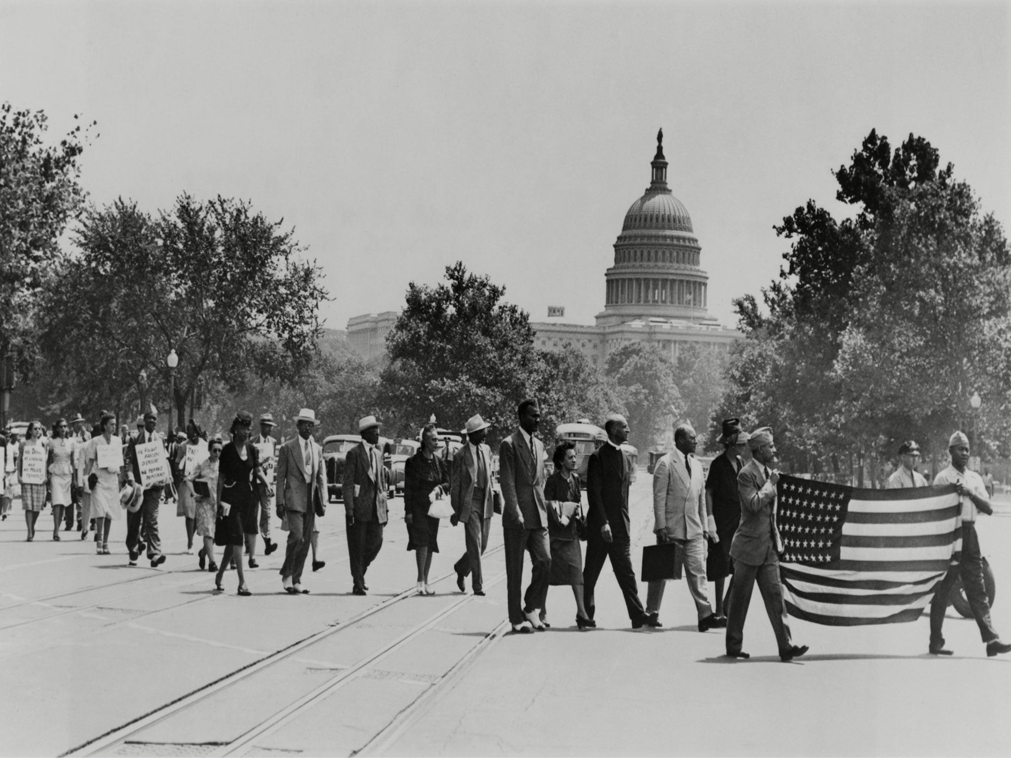 Marchers in Washington DC protest the Moore's Ford Bridge killings