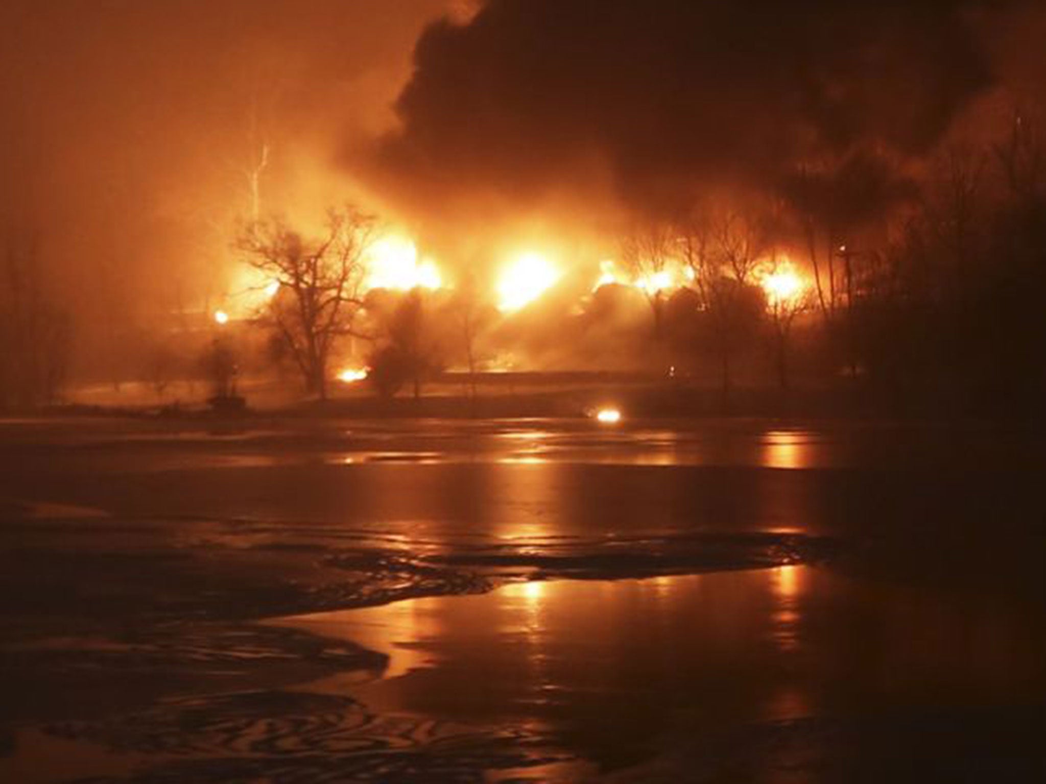 A CSX Corp train burns after derailment in Mount Carbon, West Virginia