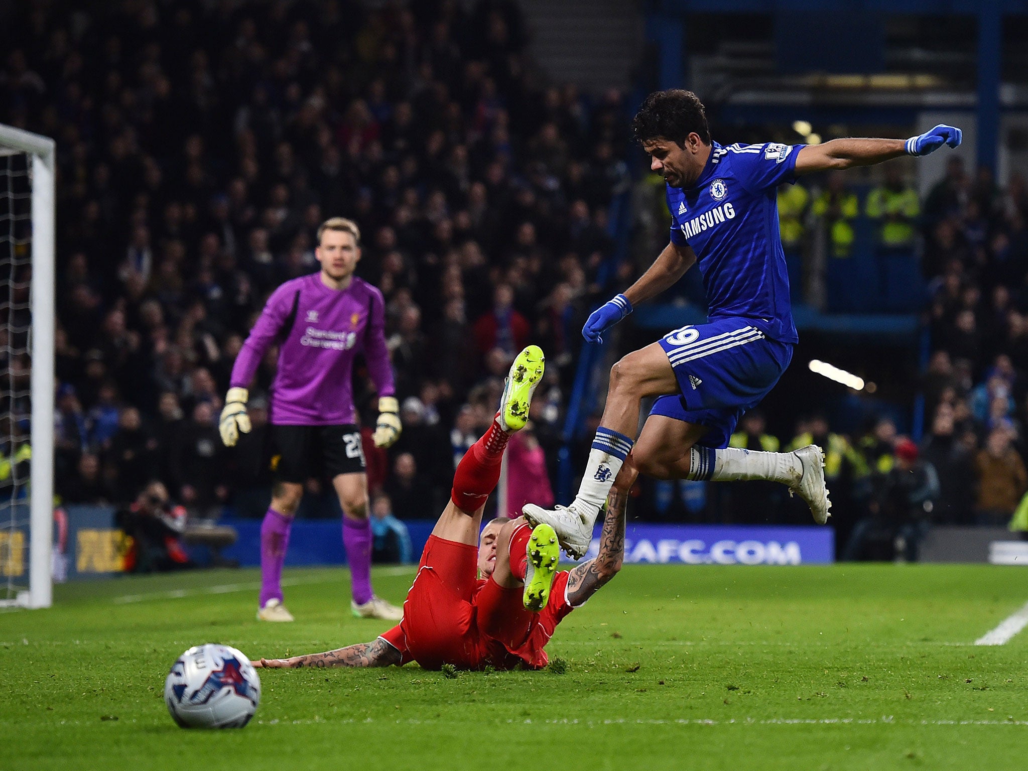 Costa was suspended for stamping on Emre Can, and he also clashed with Skrtel (pictured) in the same game