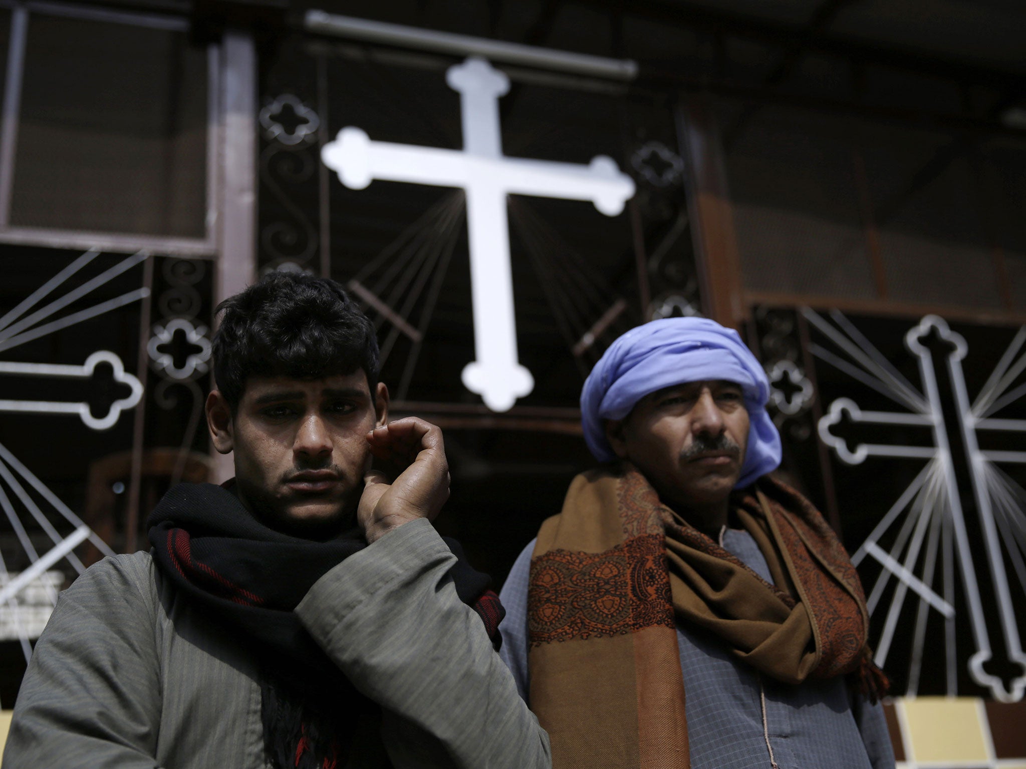 Residents of the village of el-Aour gathered at the Virgin Mary Church in the wake of the killings