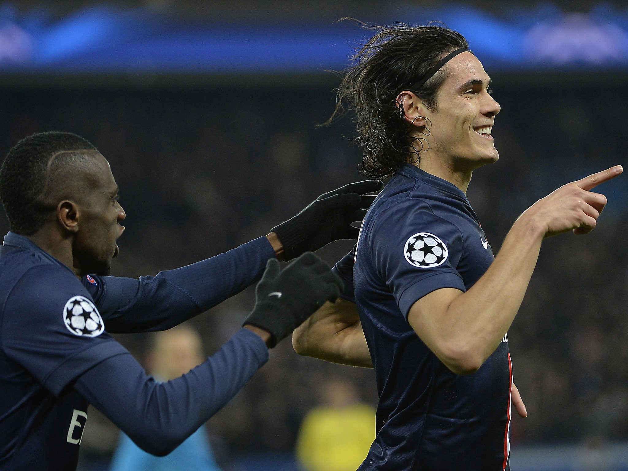 Edinson Cavani celebrates his equalising goal