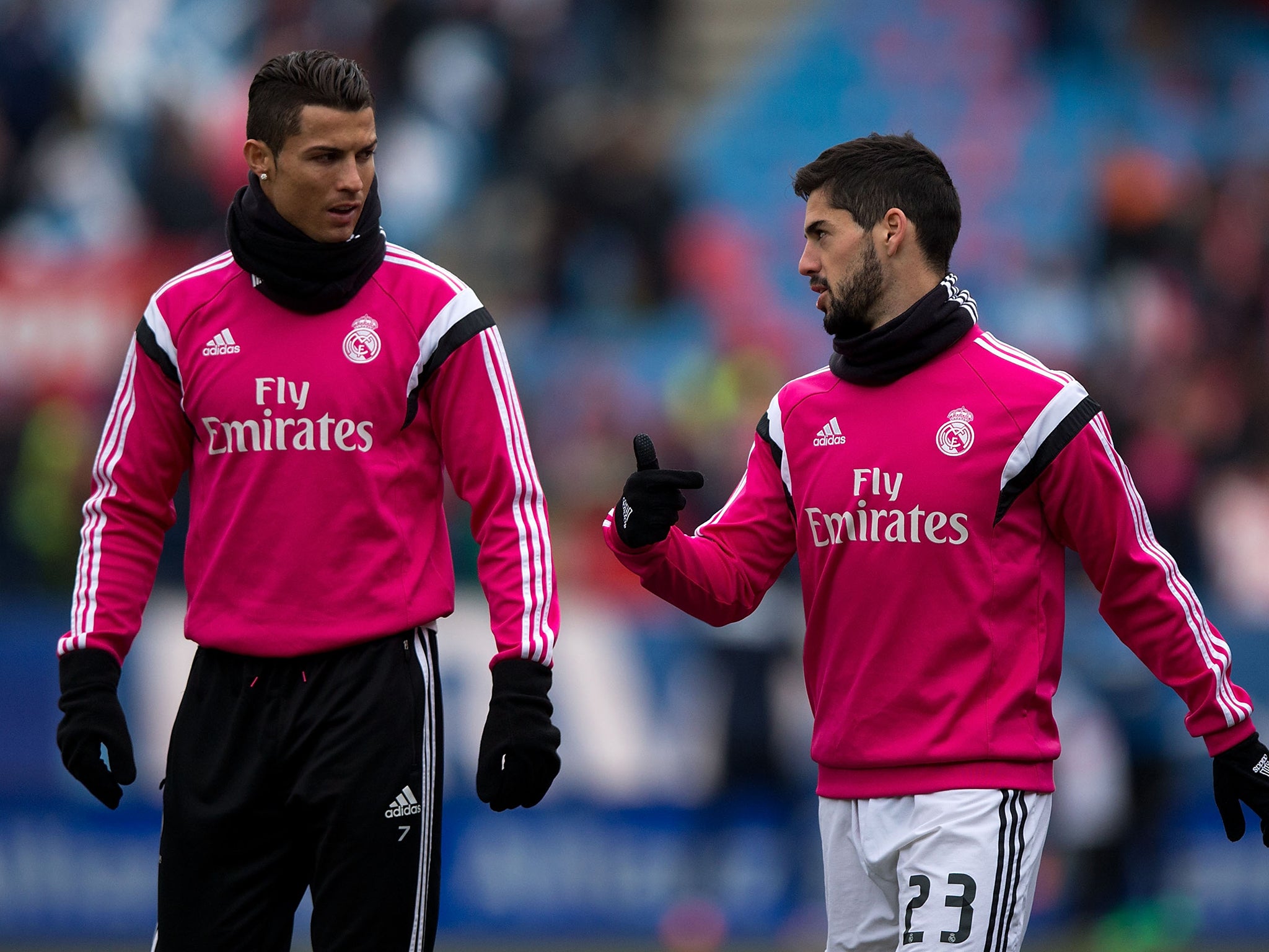 Cristiano Ronaldo talks with Isco