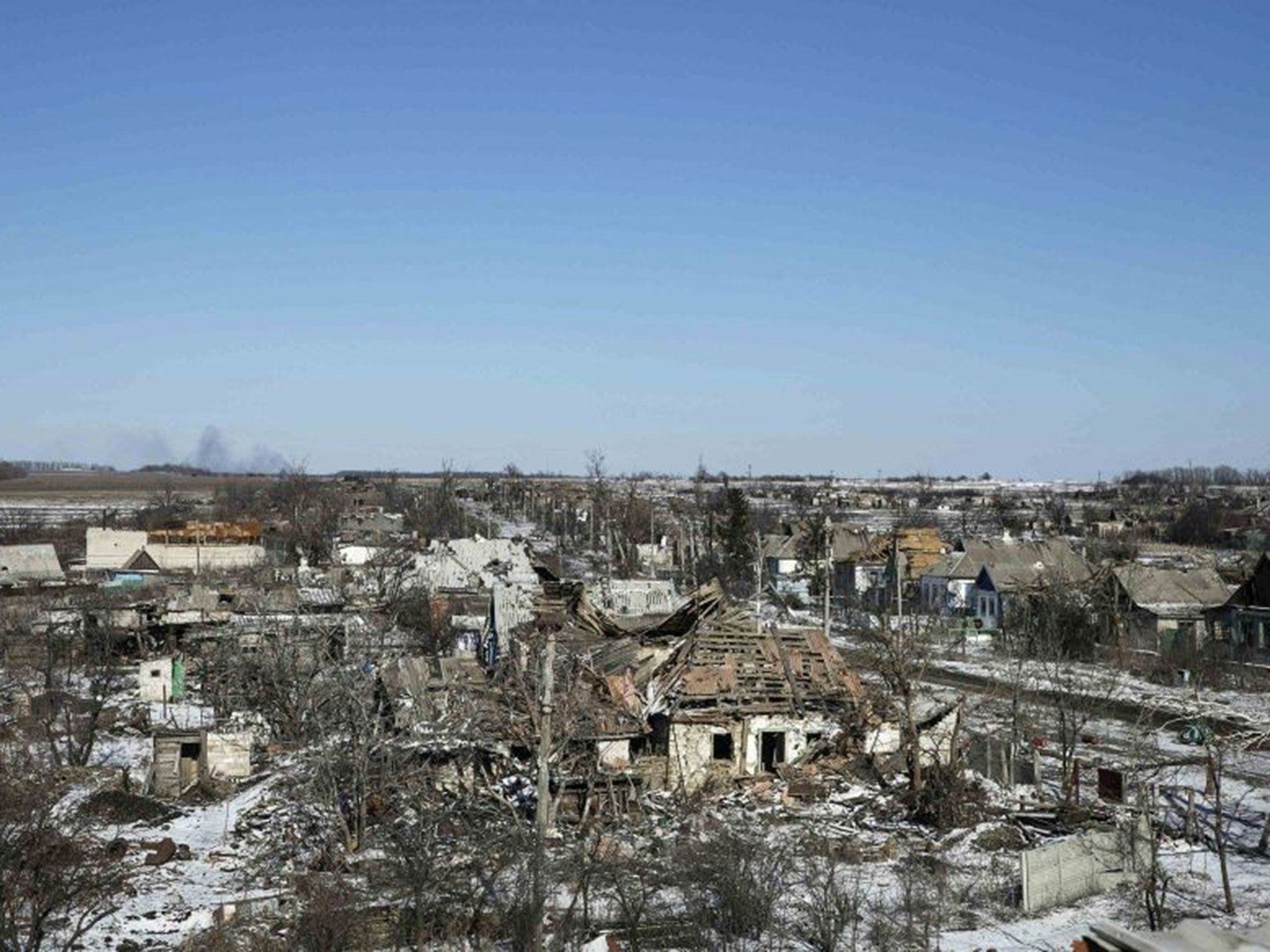 Buildings damaged by fighting are pictured in the village of Nikishine, south east of Debaltseve, on February 17, 2015.