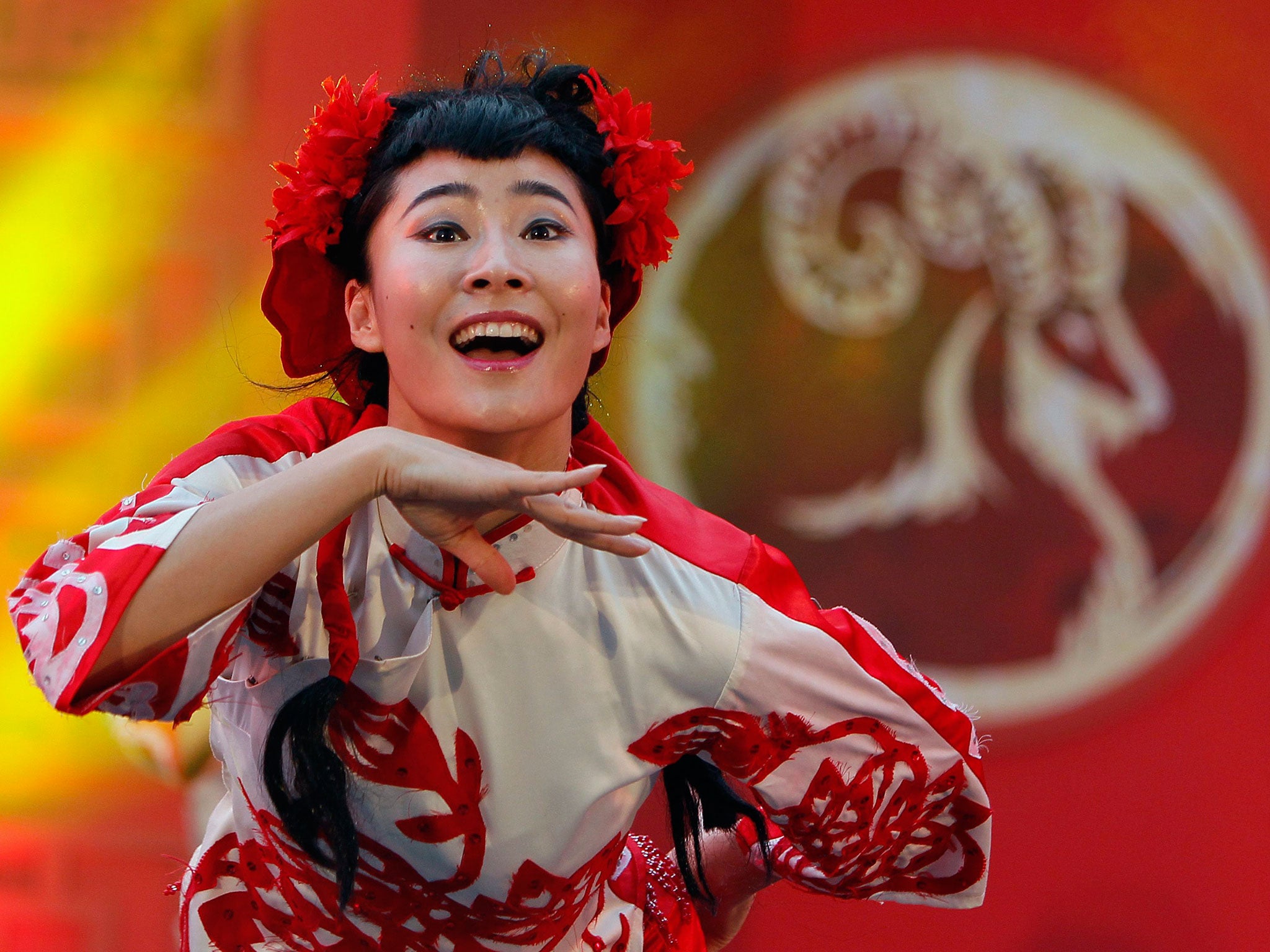 A Chinese-Thai Dancer performs a traditional Chinese dance on the eve of the Chinese Lunar New Year in Bangkok, Thailand