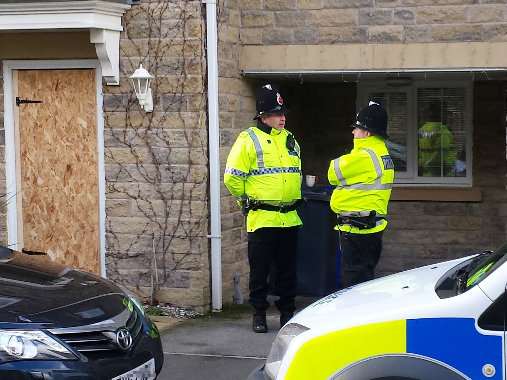 Police outside a house in Tameside following the arrest of two teenagers on counter-terrorism investigations