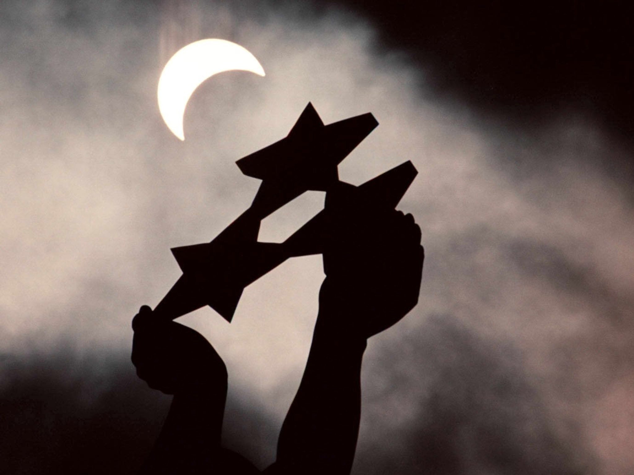 Dark days ahead? The Freedom Monument in Riga during a partial eclipse of the
Sun