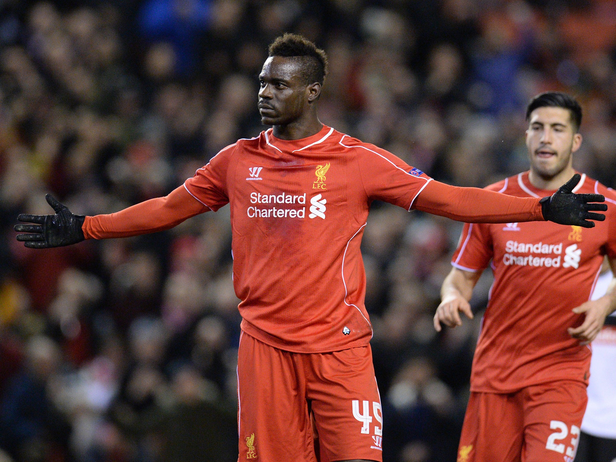 Mario Balotelli celebrates his penalty