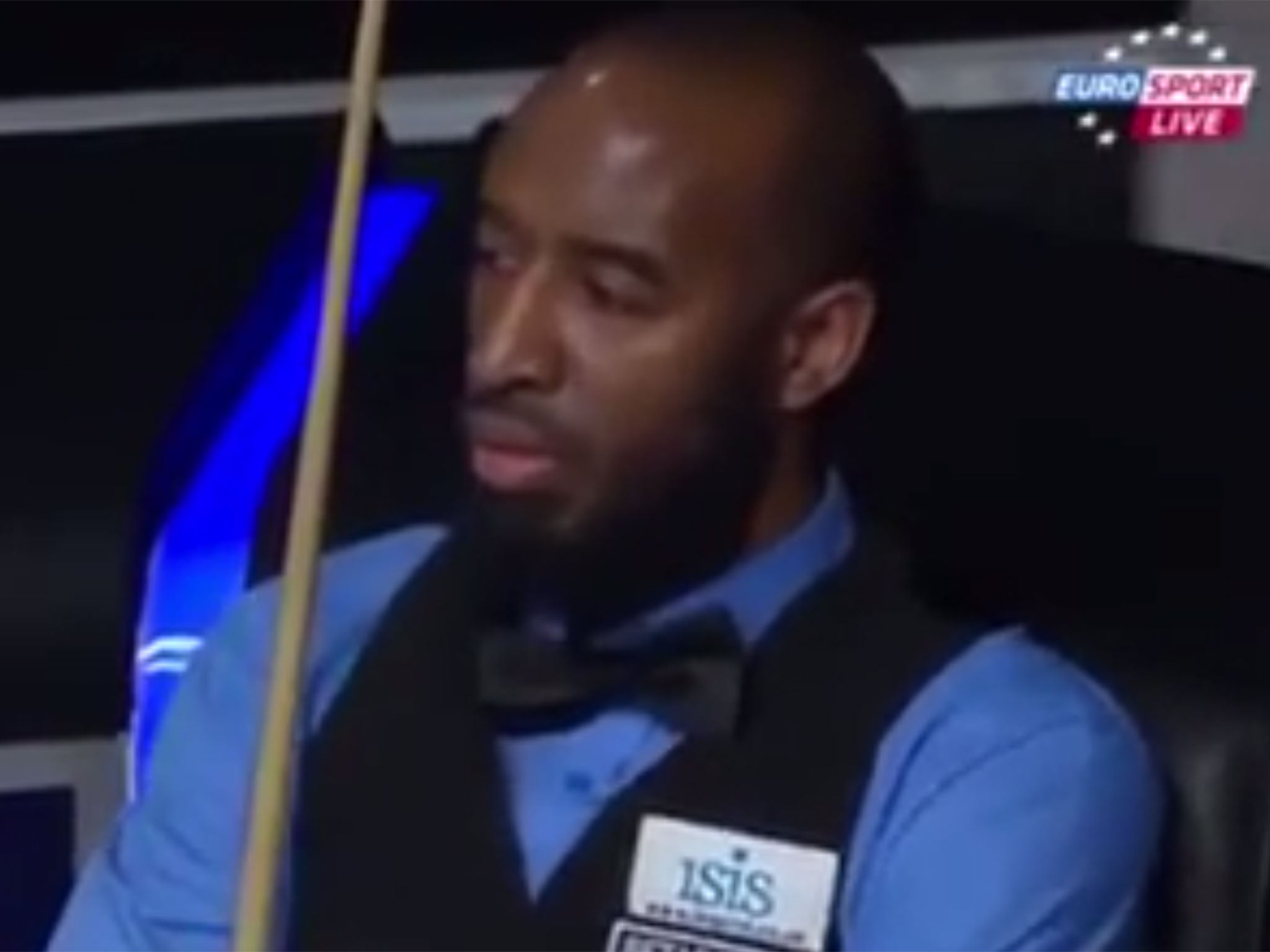 Rory McLeod wears the logo of his sponsor during his Welsh Open match