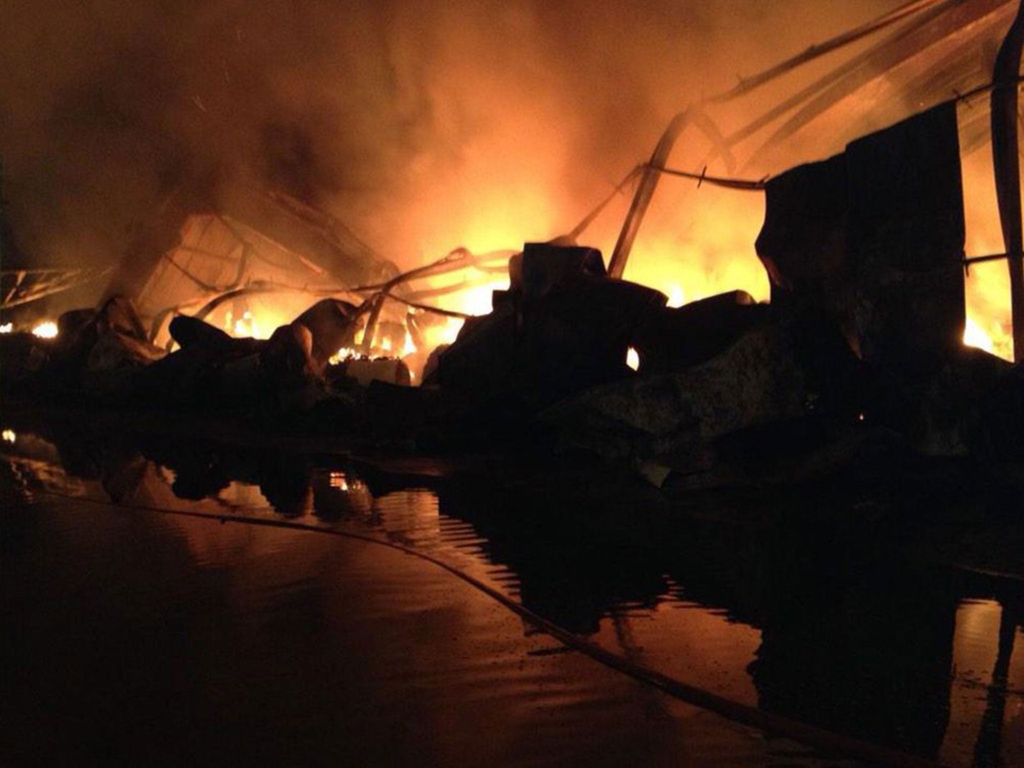 A picture taken by firefighters showing the burning warehouse in Erith