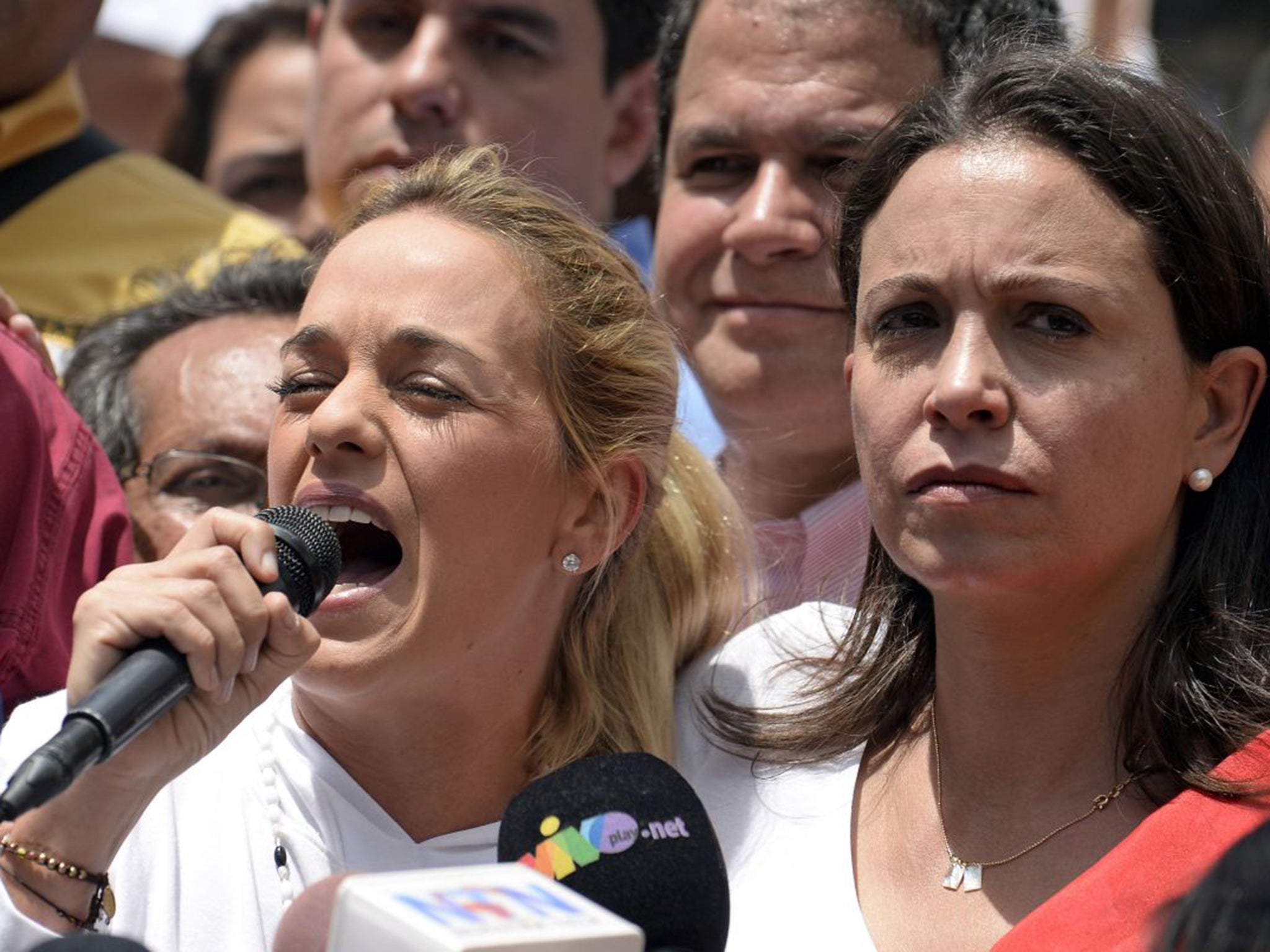 Mr Lopez's wife, Lilian Tintori, left, speaks in support of arrested Caracas Mayor Antonio Ledezma