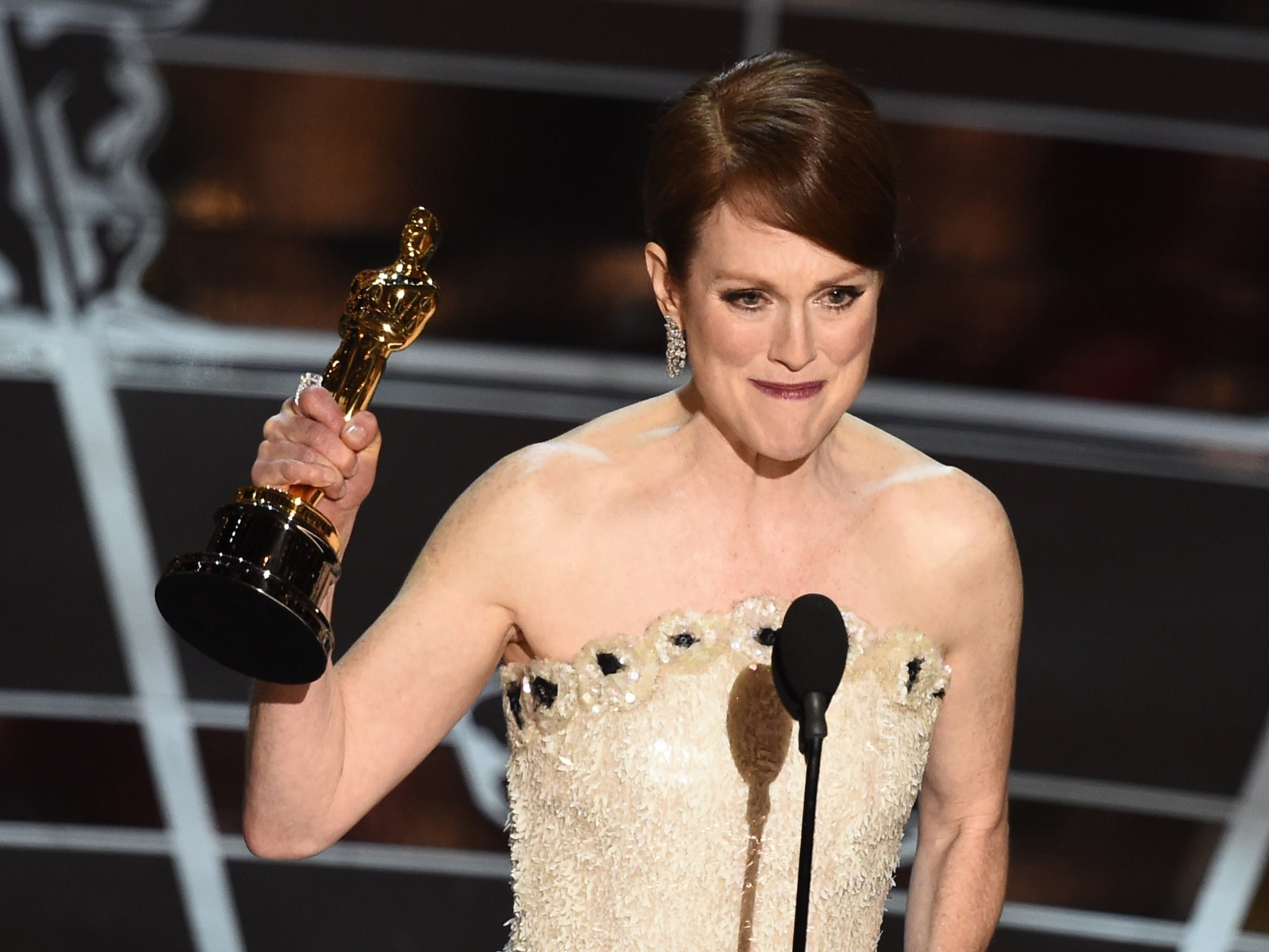 Julianne Moore wins Best Actress for her role in Still Alice at the Academy Awards