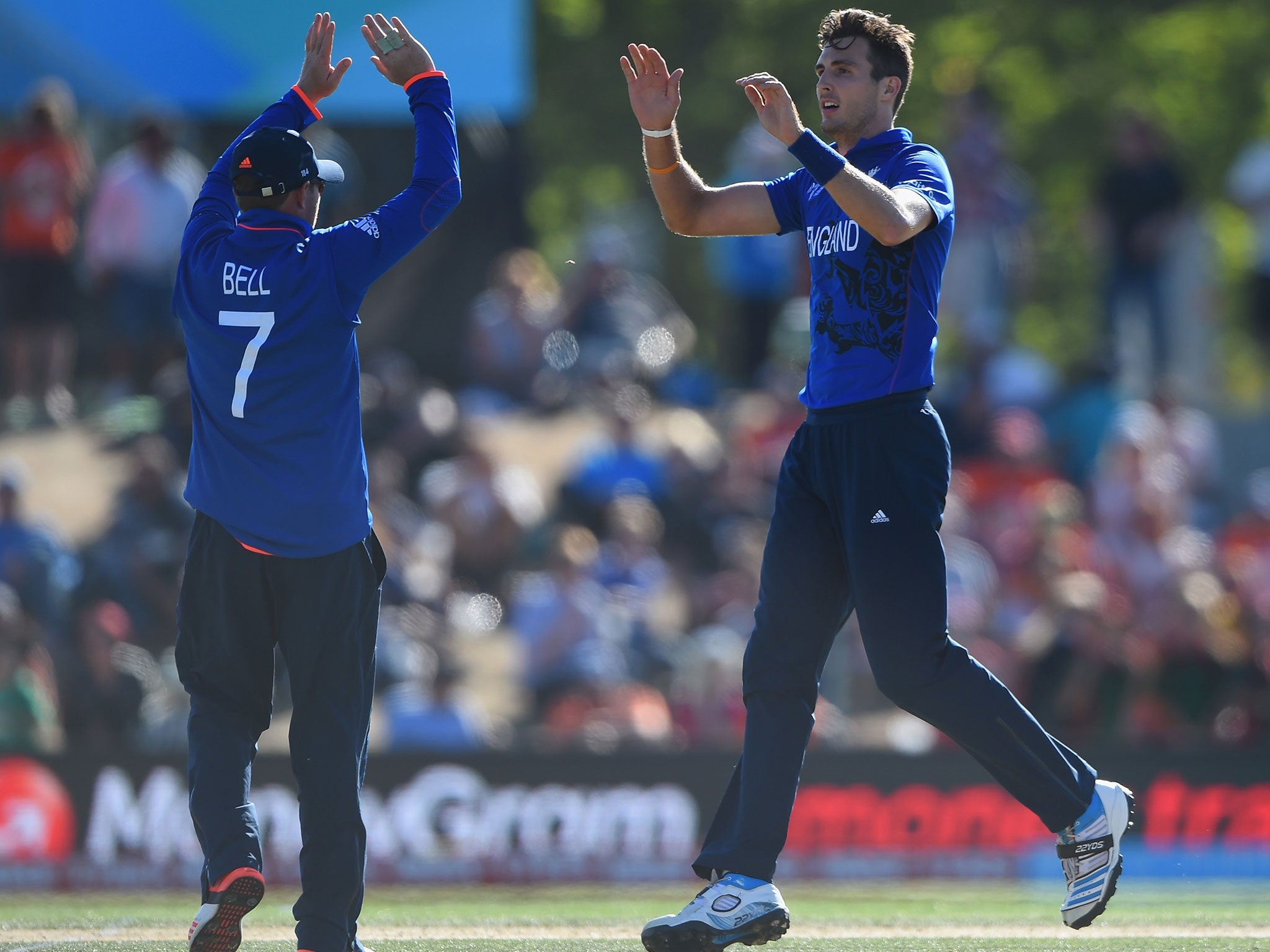 Steven Finn celebrates with Ian Bell