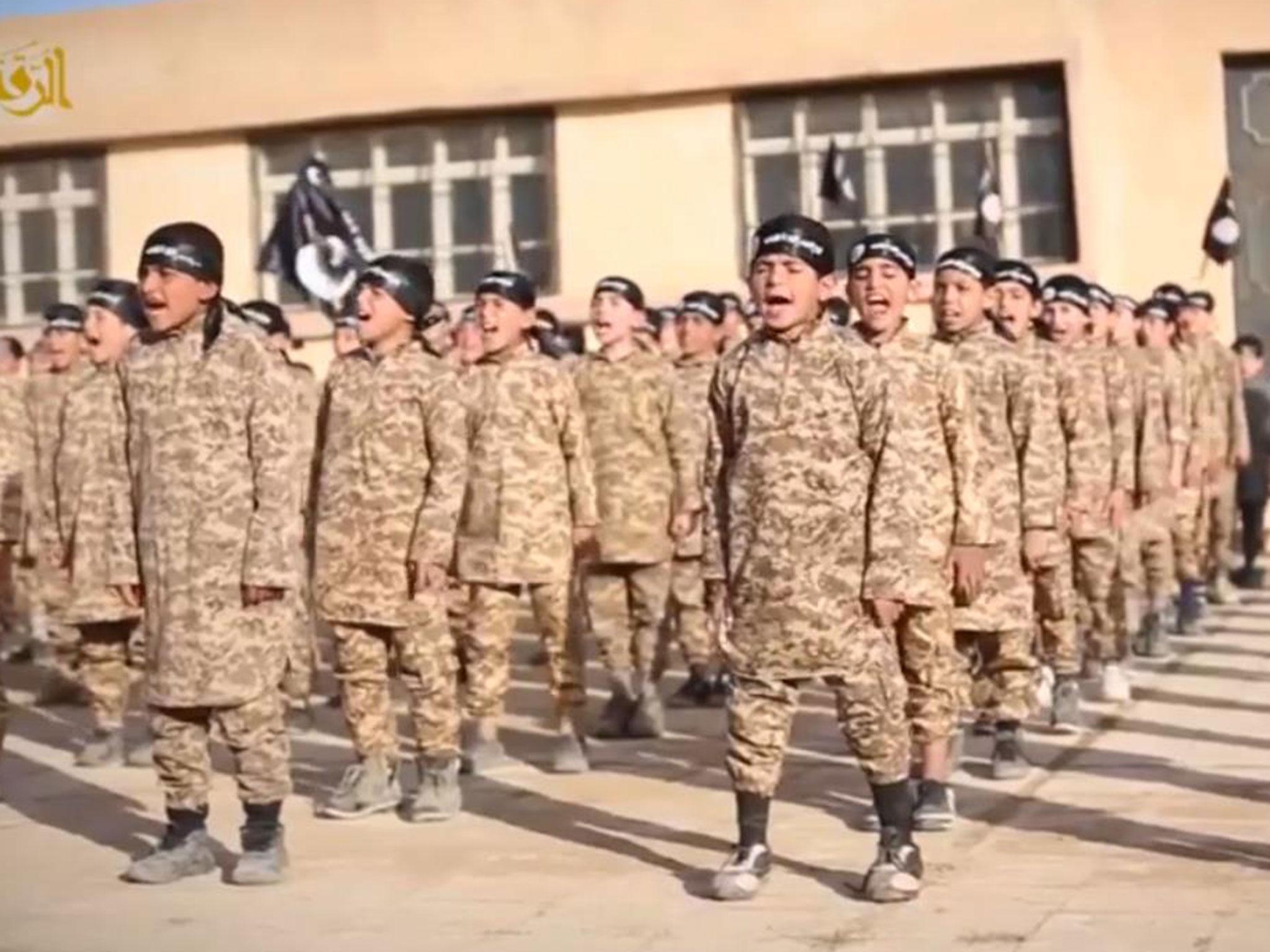 A still of an Isis video called "Al-Farouq Institute for Cubs" claiming to show a children's terror training camp