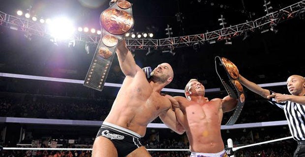 Cesaro and Tyson Kidd celebrate winning the Tag Team titles