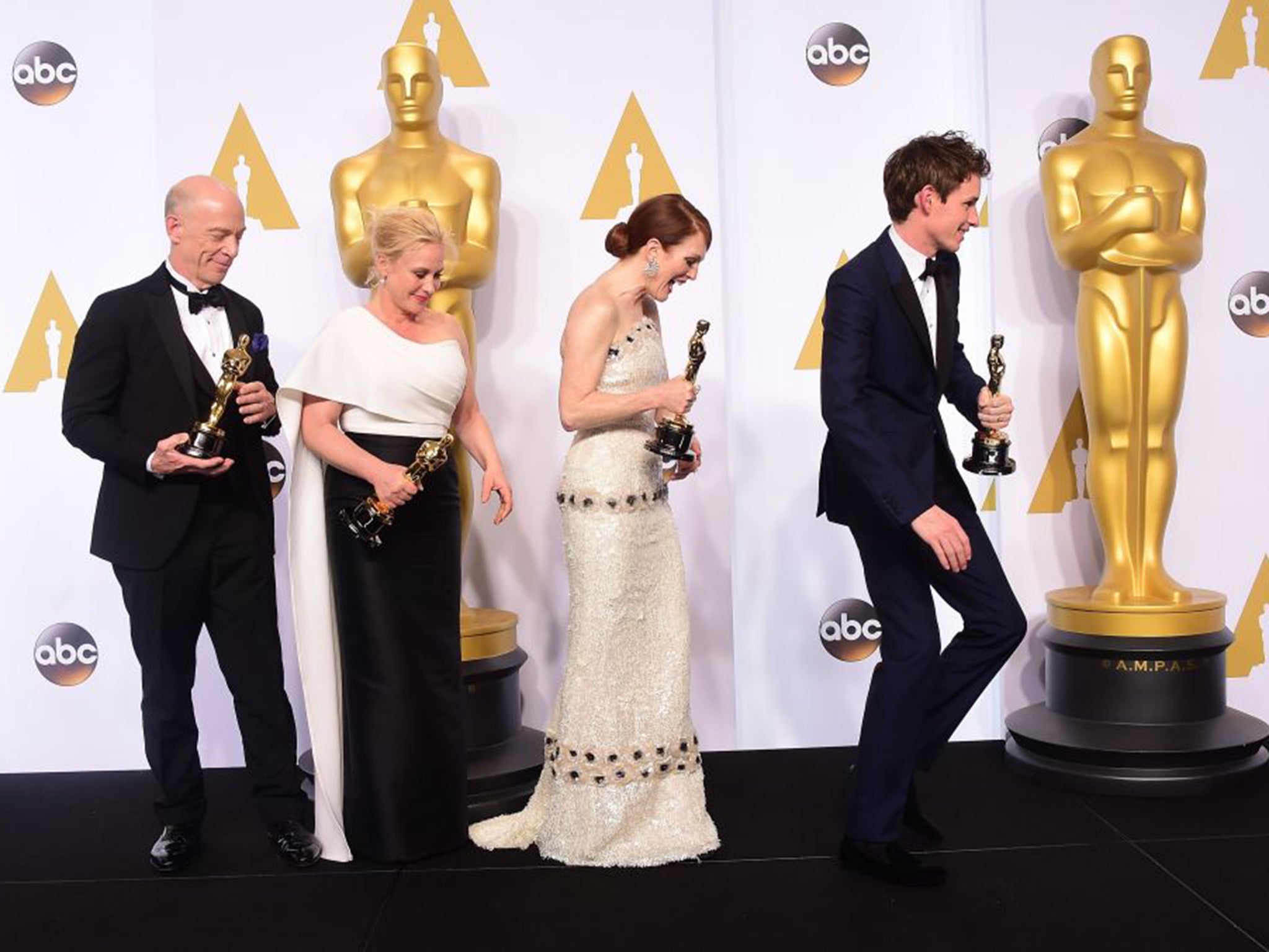 From left: JK Simmons (supporting actor), Patricia Arquette (supporting actress), Julianne Moore (actress in a leading role) and Eddie Redmayne (actor in a leading role) with their Oscars