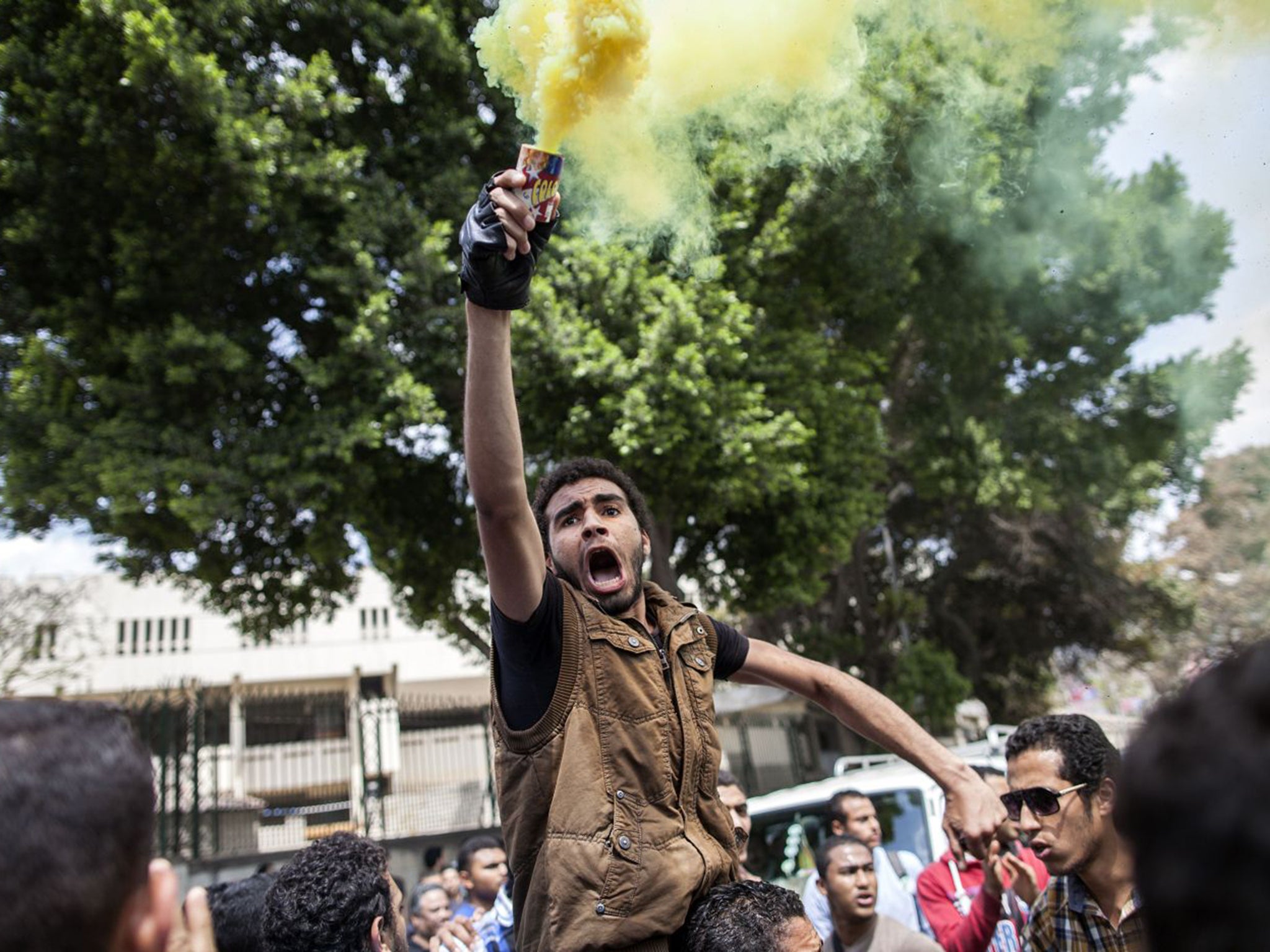 Supporters of the Muslim Brotherhood and ousted Islamist president Mohamed Morsi, demonstrating outside Cairo University in April last year