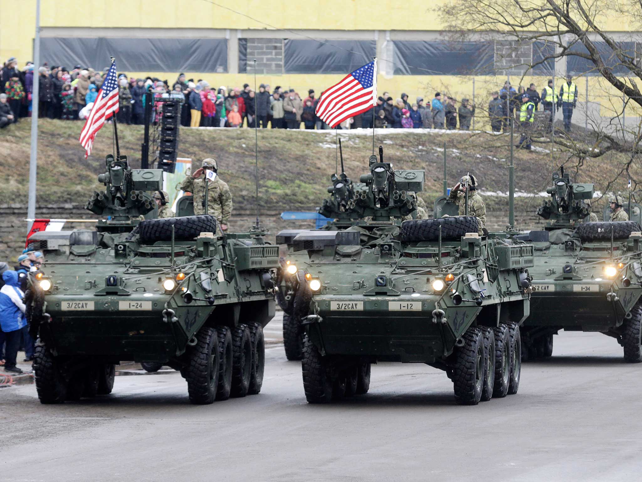 US soldiers attend military parade celebrating Estonia's Independence Day near border crossing with Russia in Narva