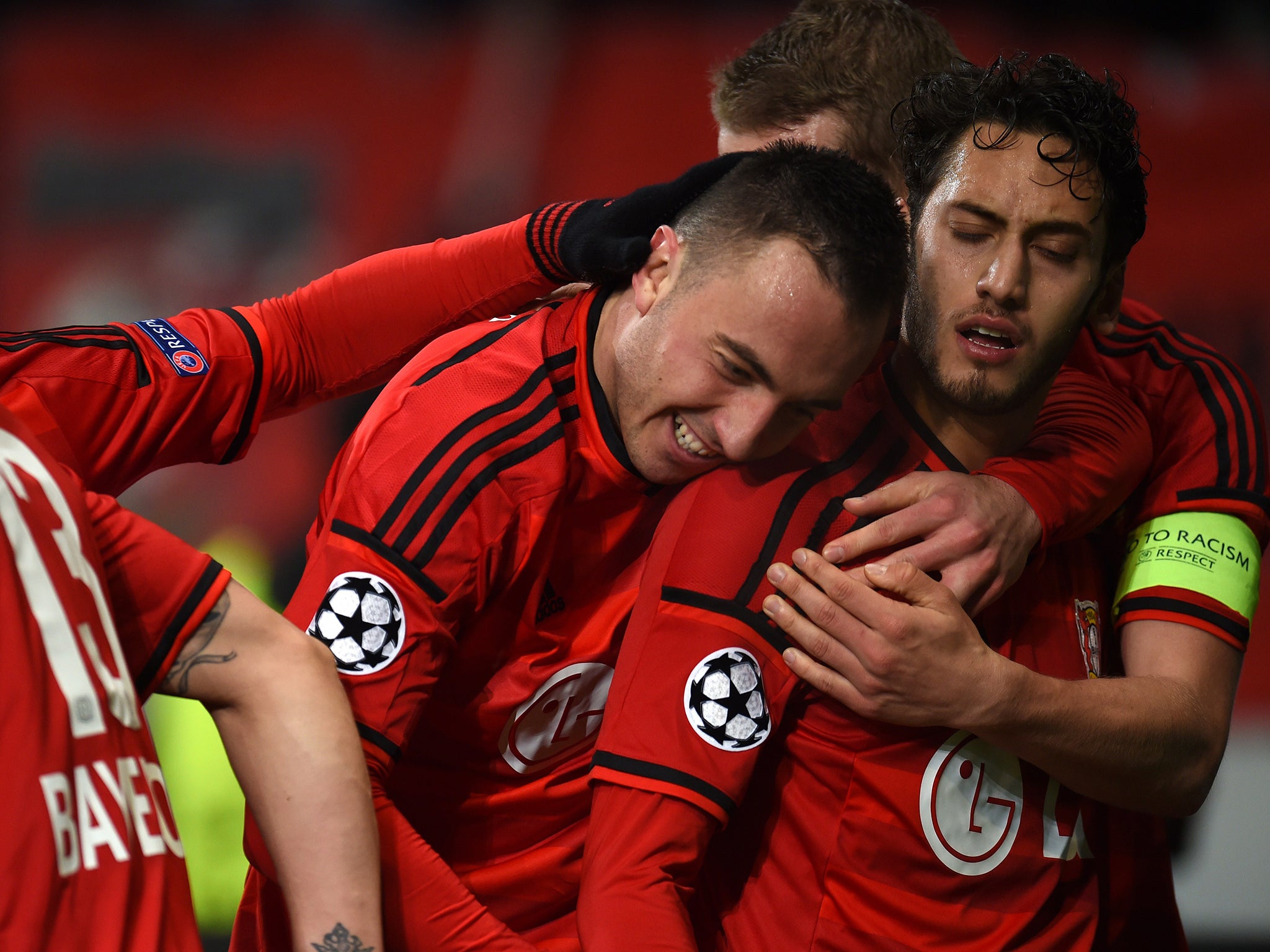 Hakan Calhanoglu celebrates his goal against Atletico Madrid