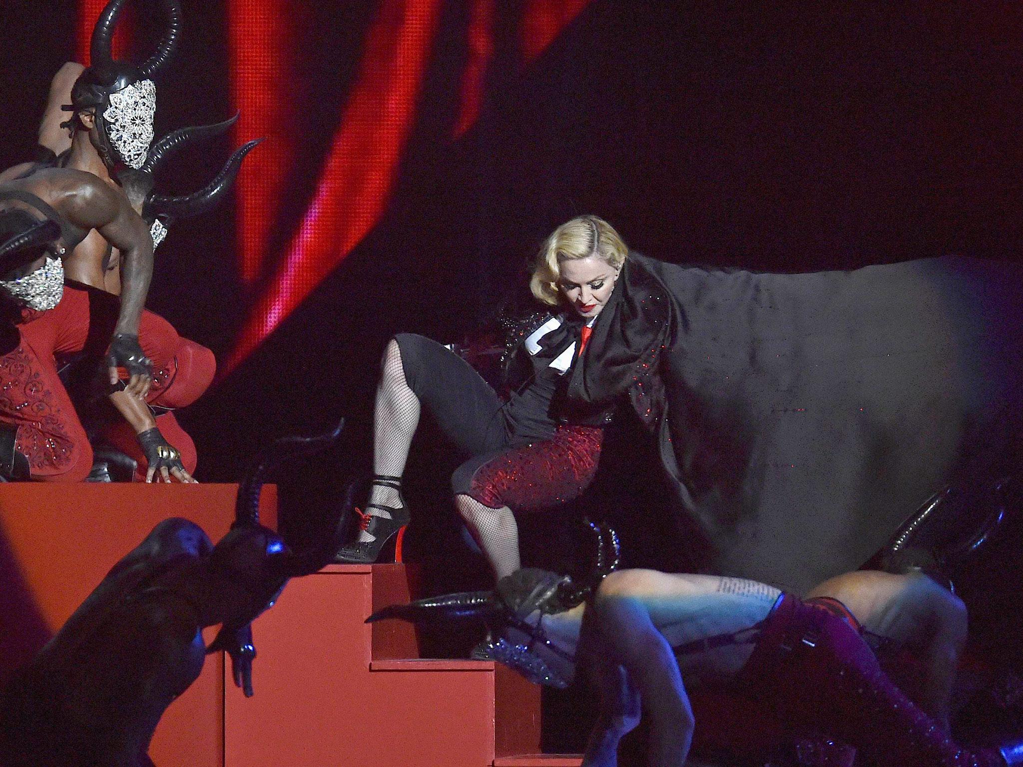 Madonna falls during her performance at the BRIT music awards at the O2 Arena in Greenwich, London