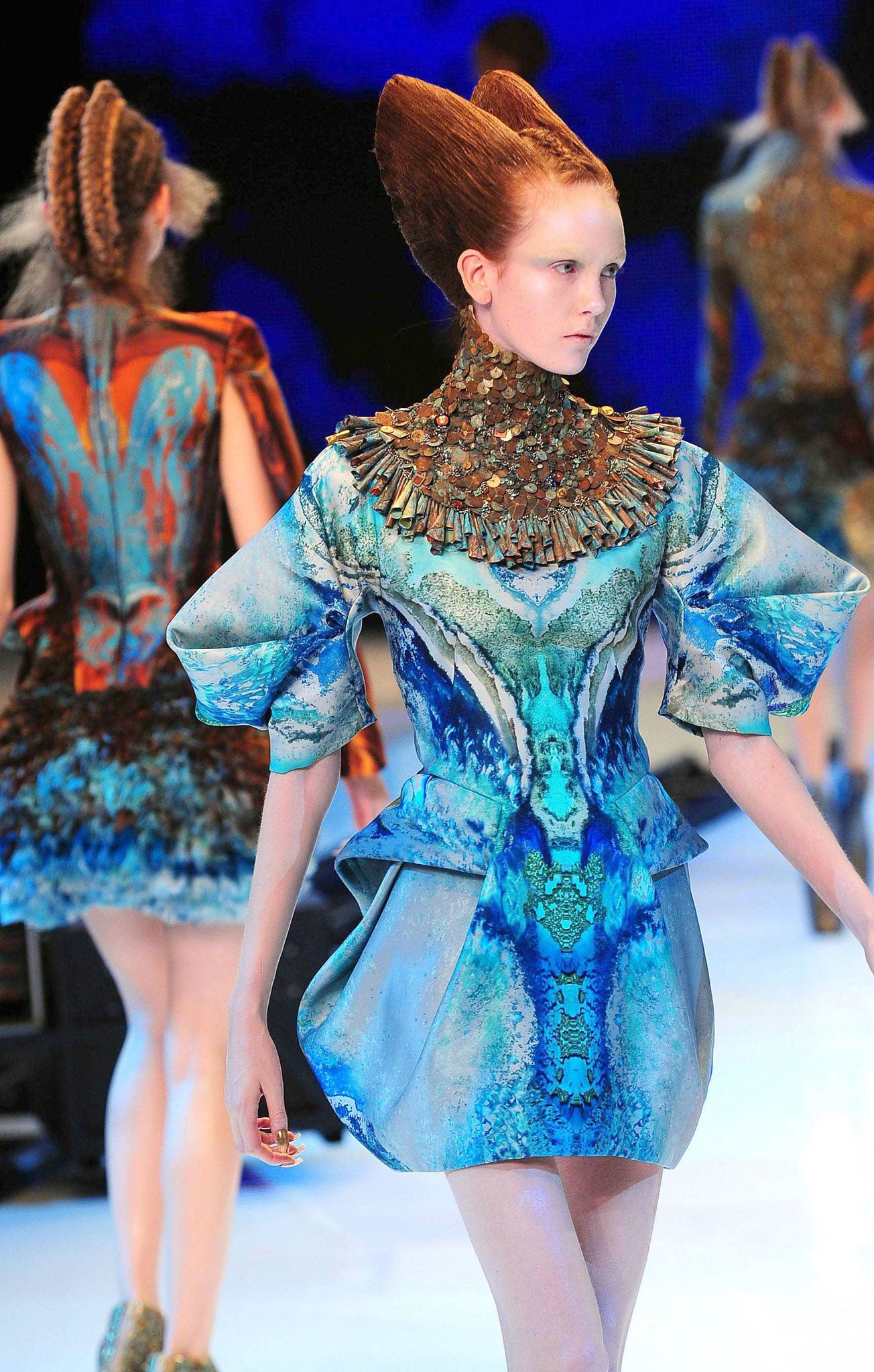 Models were turned into alien-like beings, their clothing reptilian prints at his Spring/Summer 2010 show (Rex)